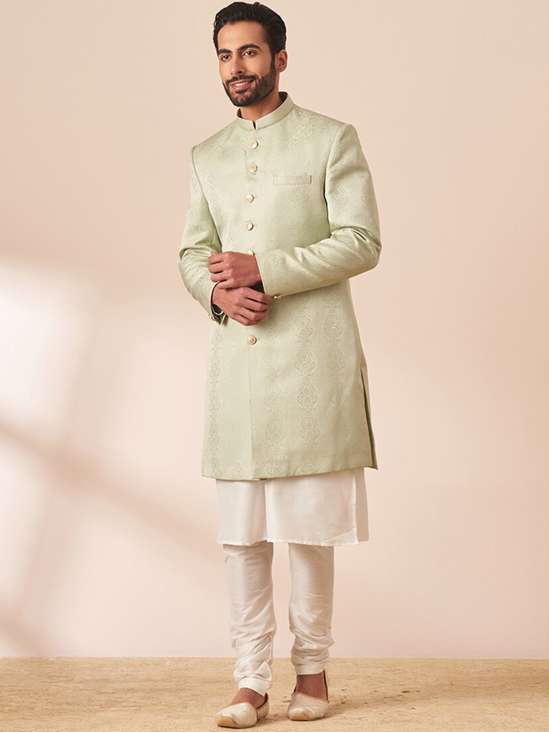 

Manyavar Men Woven Design Brocade Sherwani Set, Green