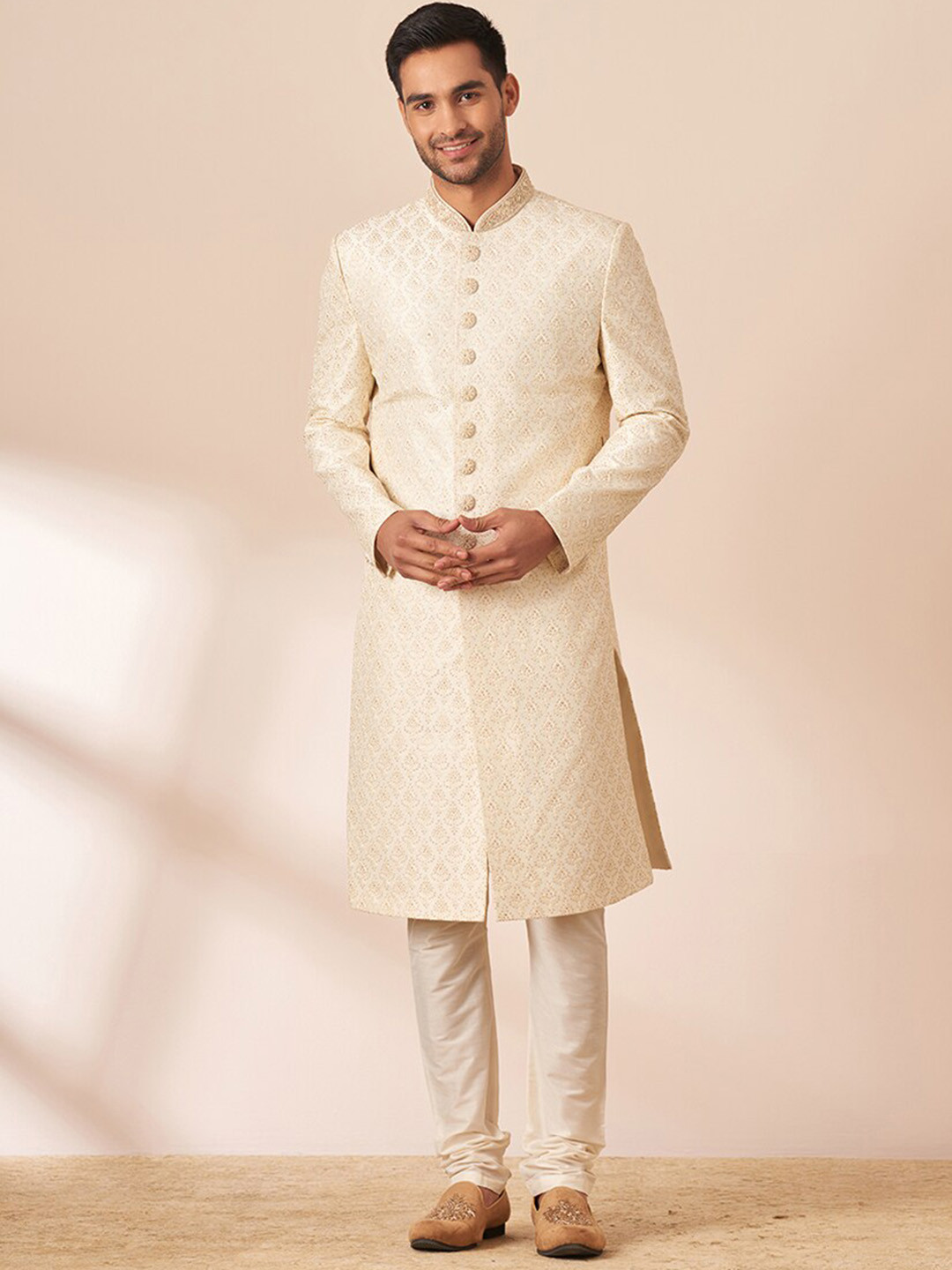 

Manyavar Men Self-Design Sherwani With Churidar, Cream