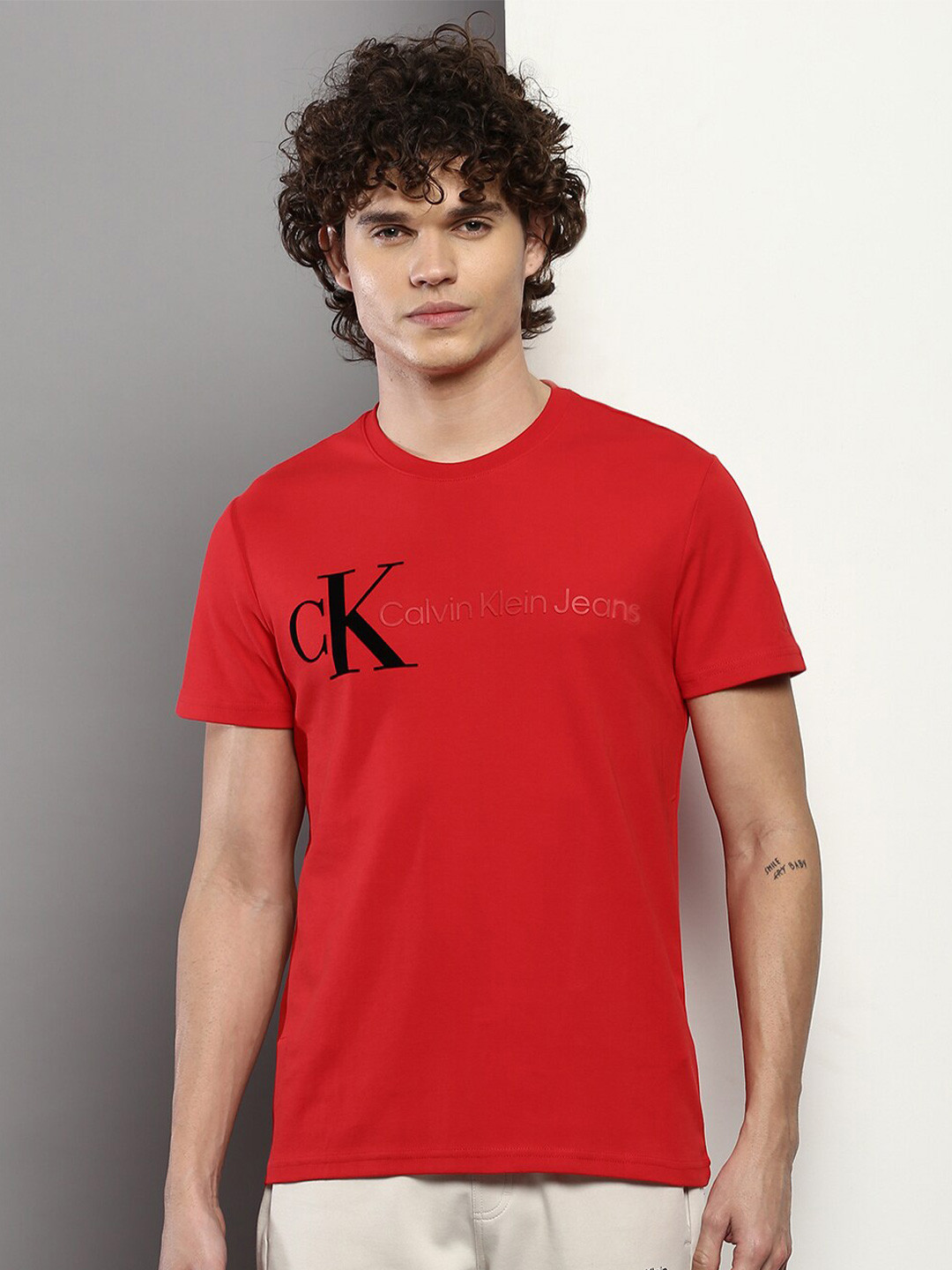 

Calvin Klein Jeans Men Typography Printed Slim Fit Cotton T-shirt, Red