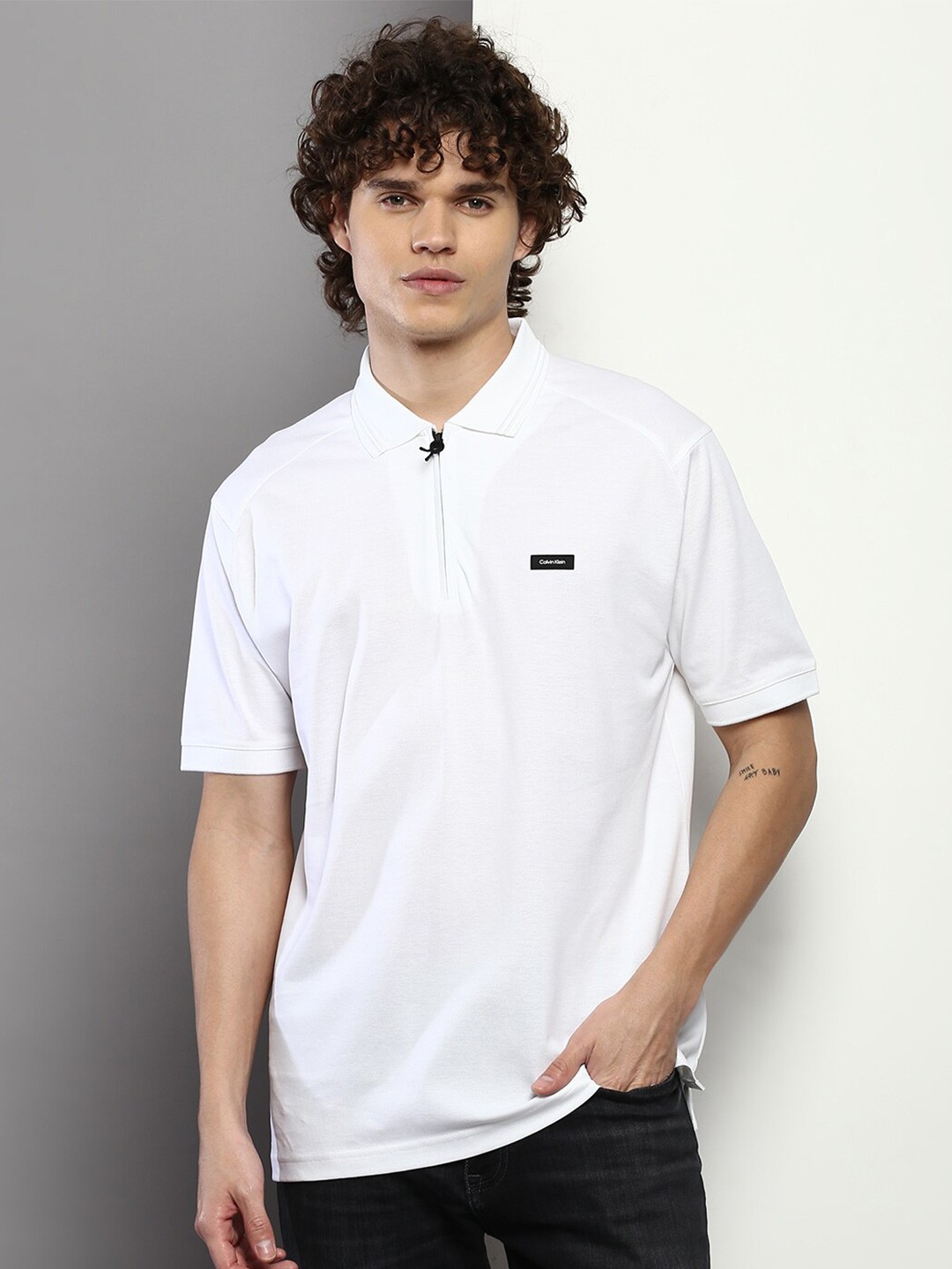 

Calvin Klein Jeans Men Polo Collar Pure Cotton T-shirt, White