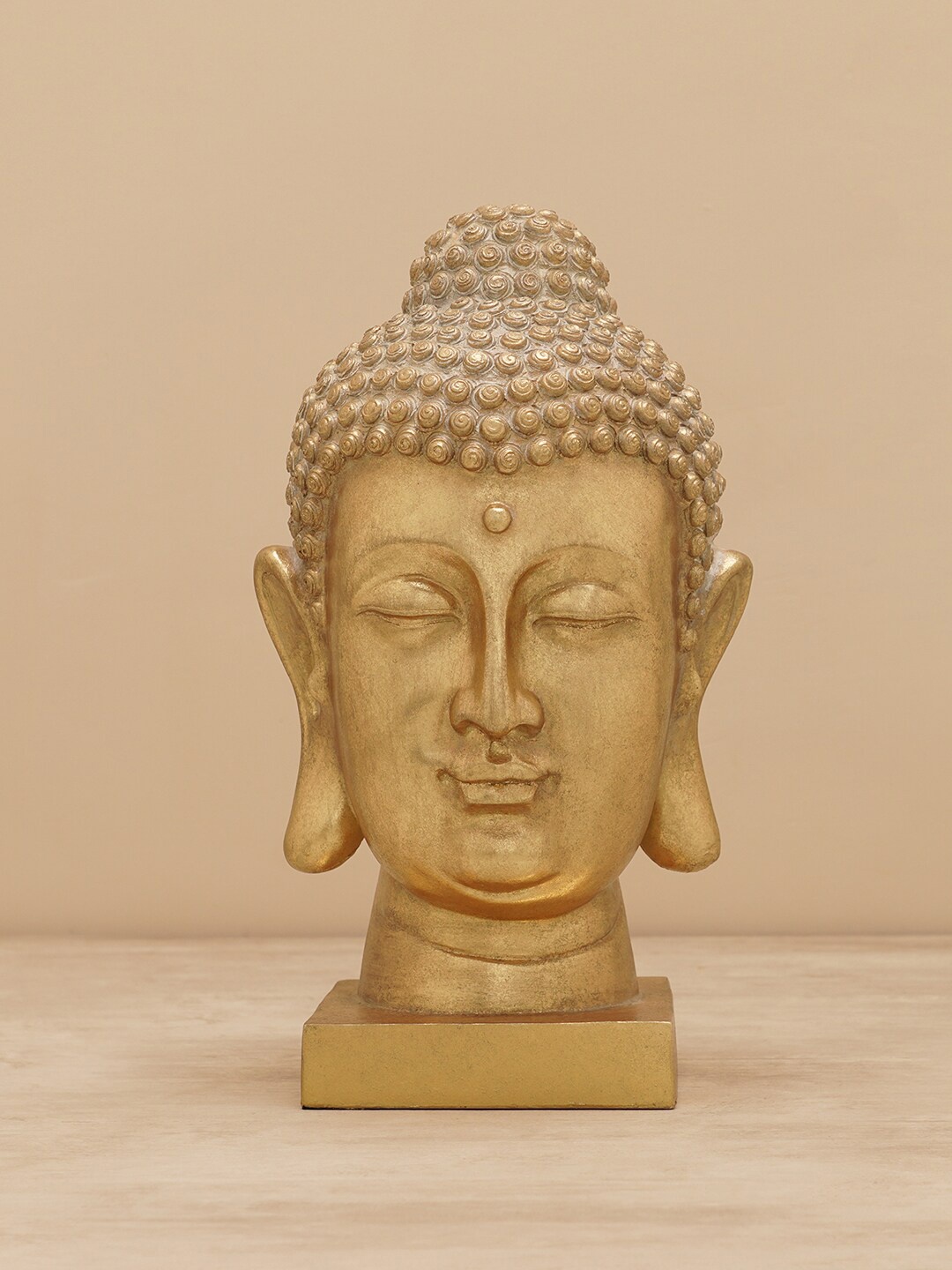 

Pure Home and Living Yellow Polyresin Buddha Head with Square Base Showpiece