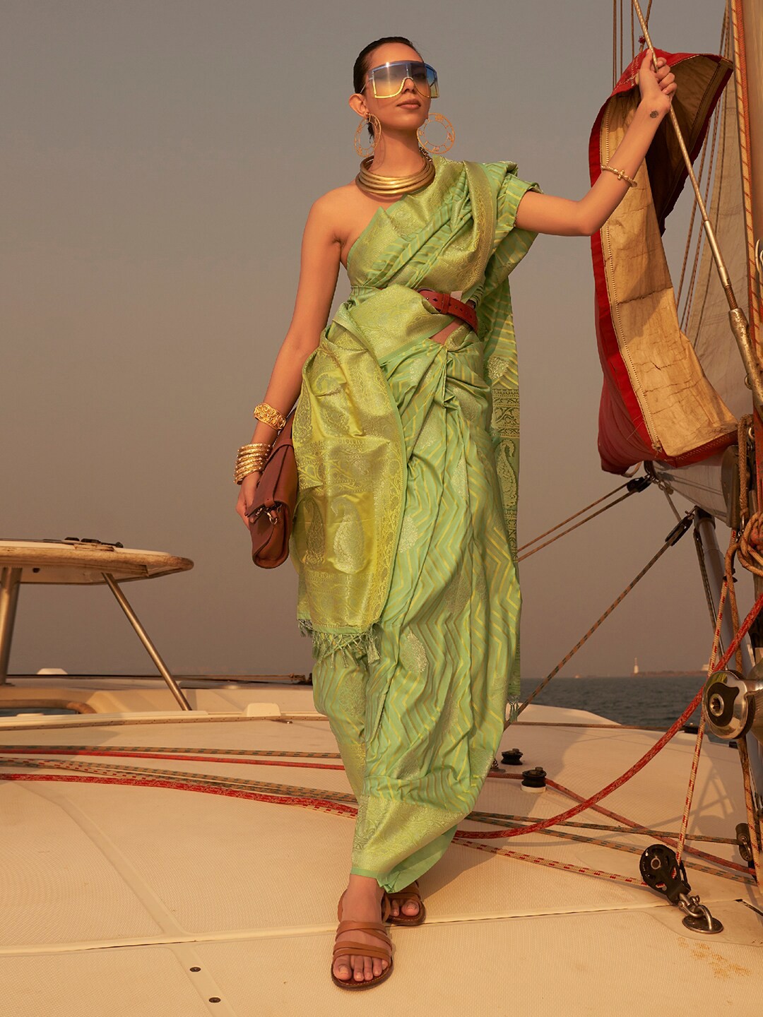 

Saree mall Woven Design Zari Silk Blend Banarasi Saree, Green