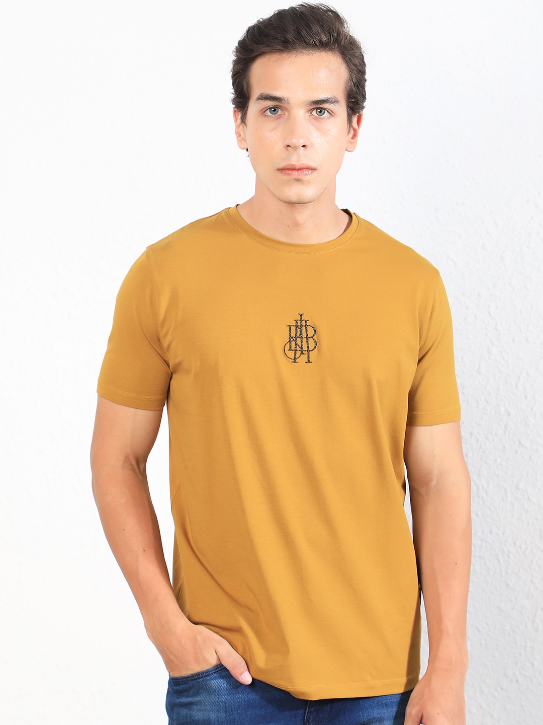 

RARE RABBIT Men Rings-4 Slim Fit Solid Polo Collar T-Shirt, Mustard