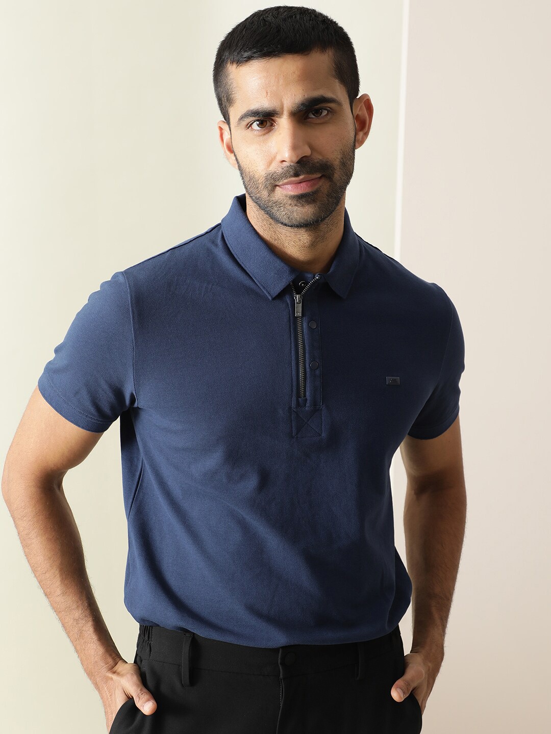 

RARE RABBIT Men Rings-4 Slim Fit Solid Polo Collar T-Shirt, Blue