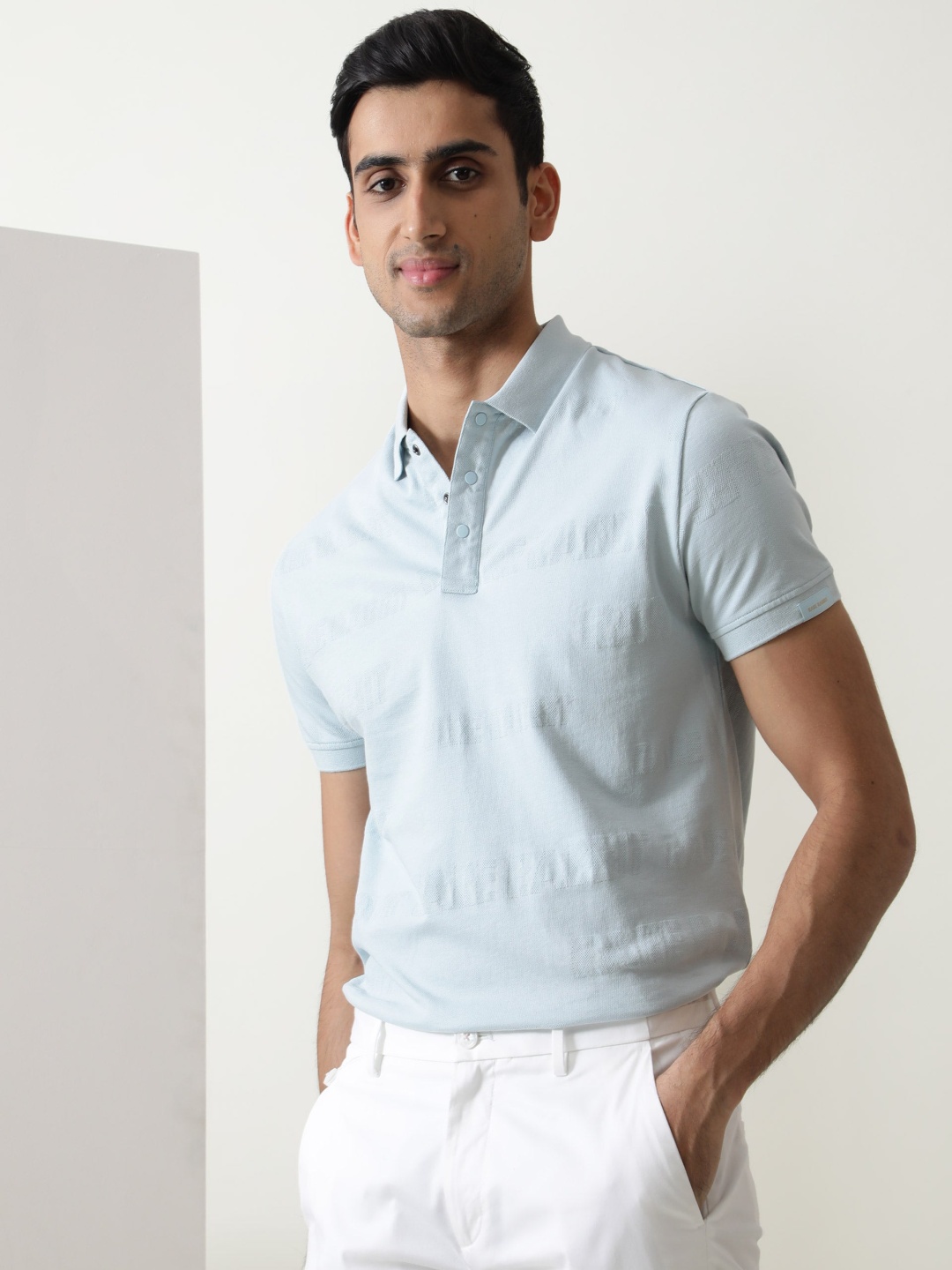 

RARE RABBIT Men Rings-4 Slim Fit Solid Polo Collar T-Shirt, Blue