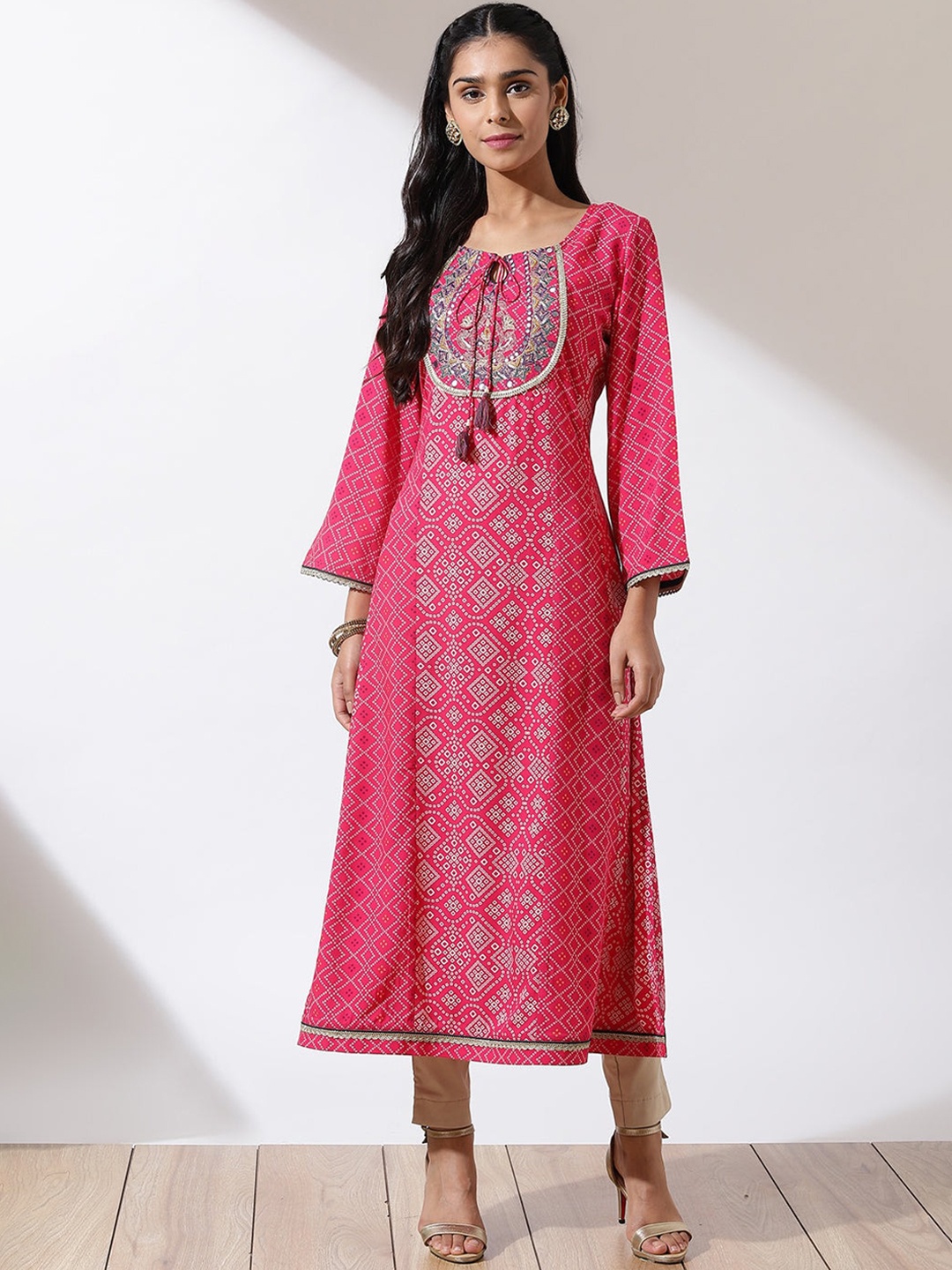 

Lakshita Women Bandhani Printed Tie-Up Neck Flared Sleeves Mirror Work Kurta, Fuchsia