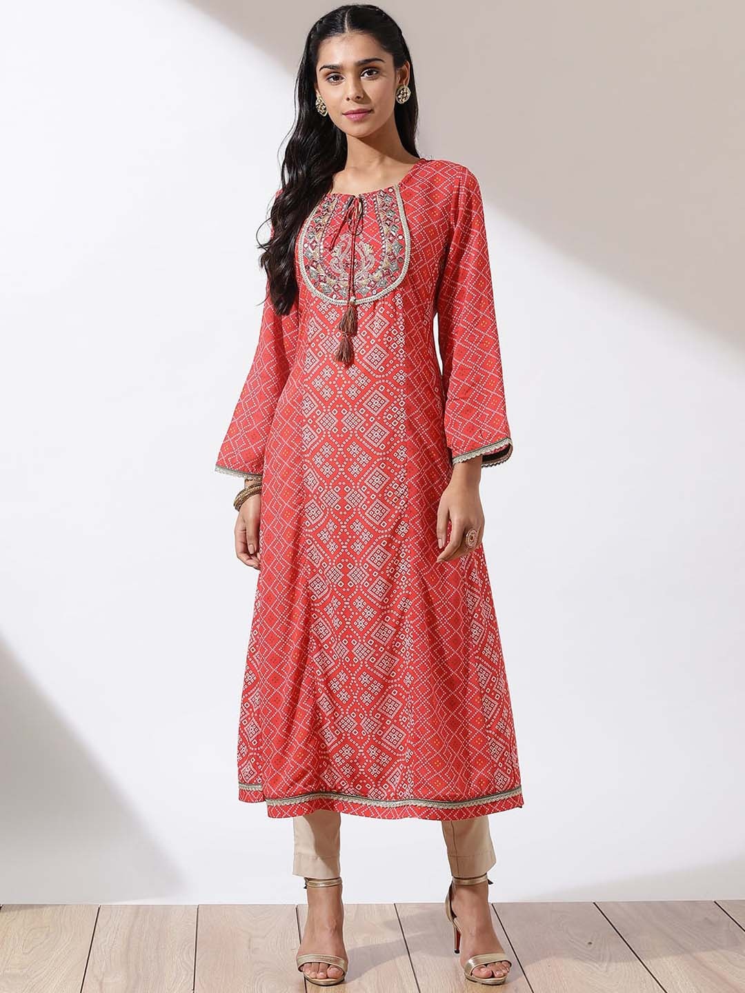

Lakshita Women Bandhani Printed Tie-Up Neck Mirror Work Kurta, Orange