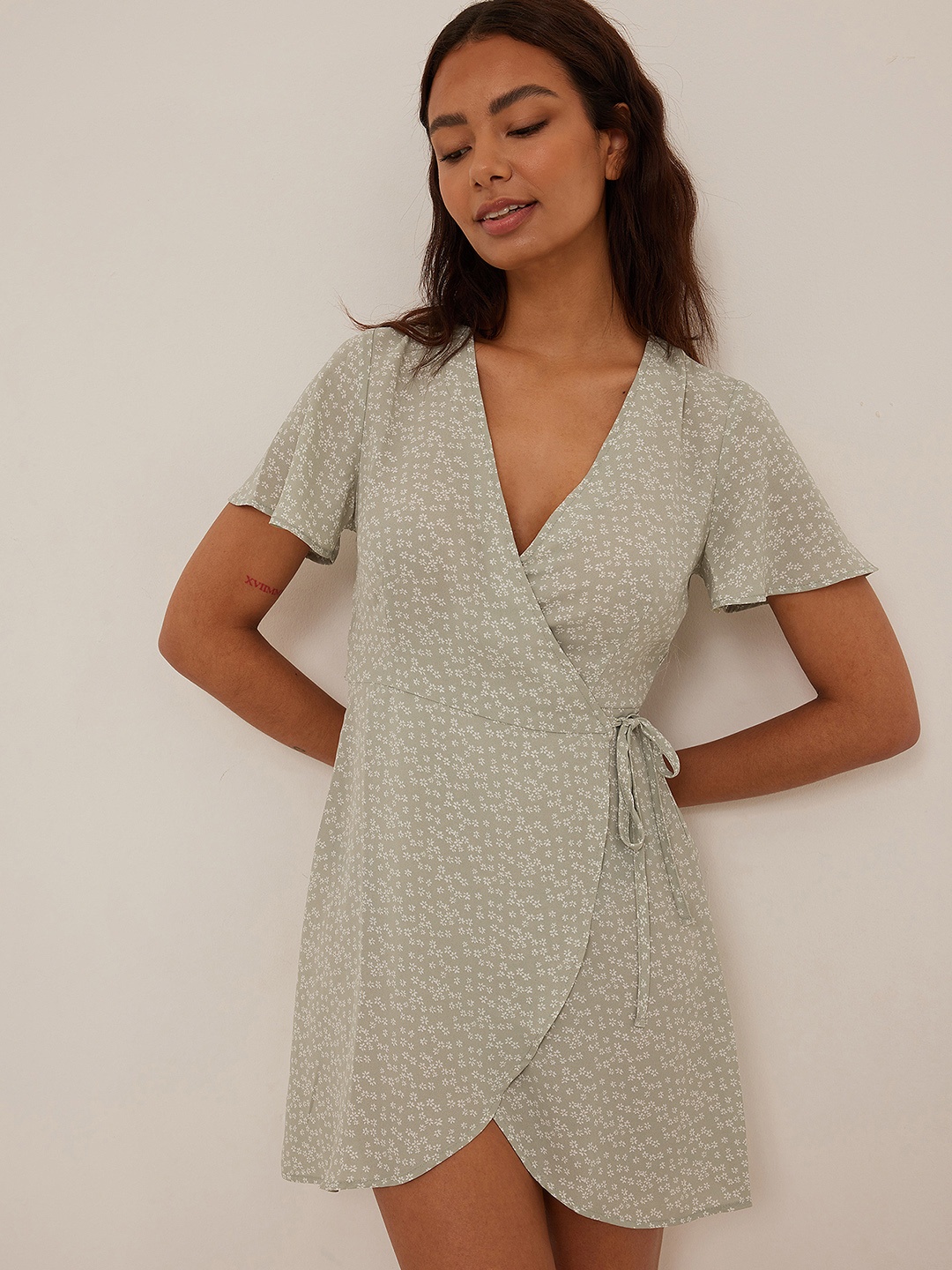 

NA-KD Floral Wrap Mini Dress, Green