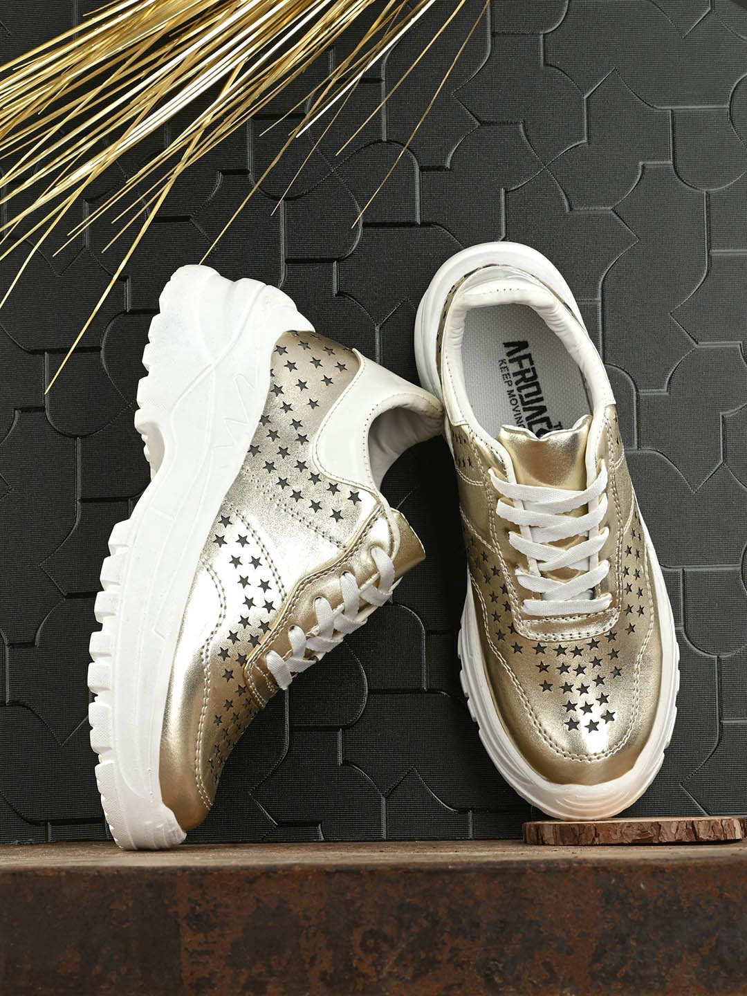 

AfroJack Women Laser Cuts Contrast Sole Sneakers, Gold