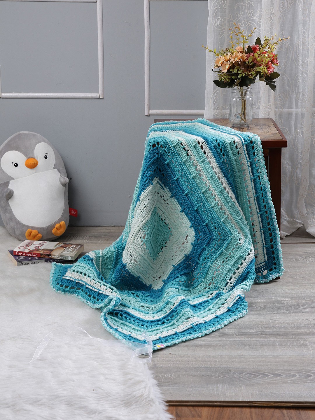 

Magic Needles Blue & Sea Green Geometric AC Room 1000 GSM Wool Single Bed Pram