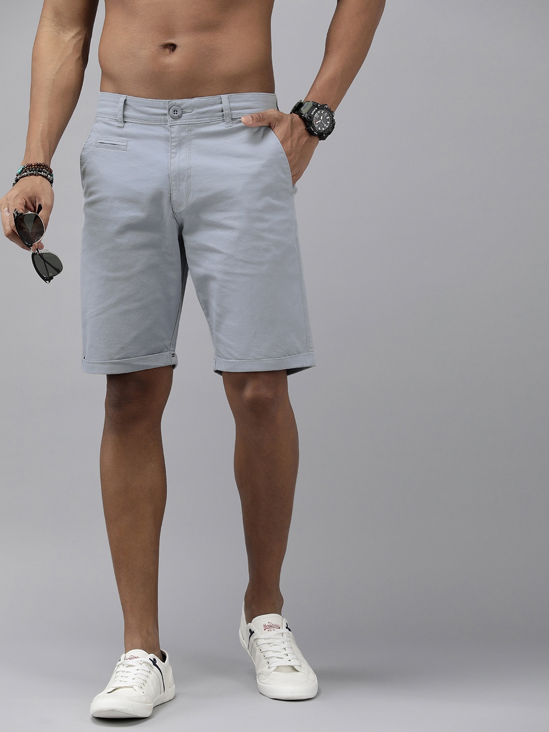 

The Roadster Life Co. Men Solid Mid-Rise Denim Shorts, Blue