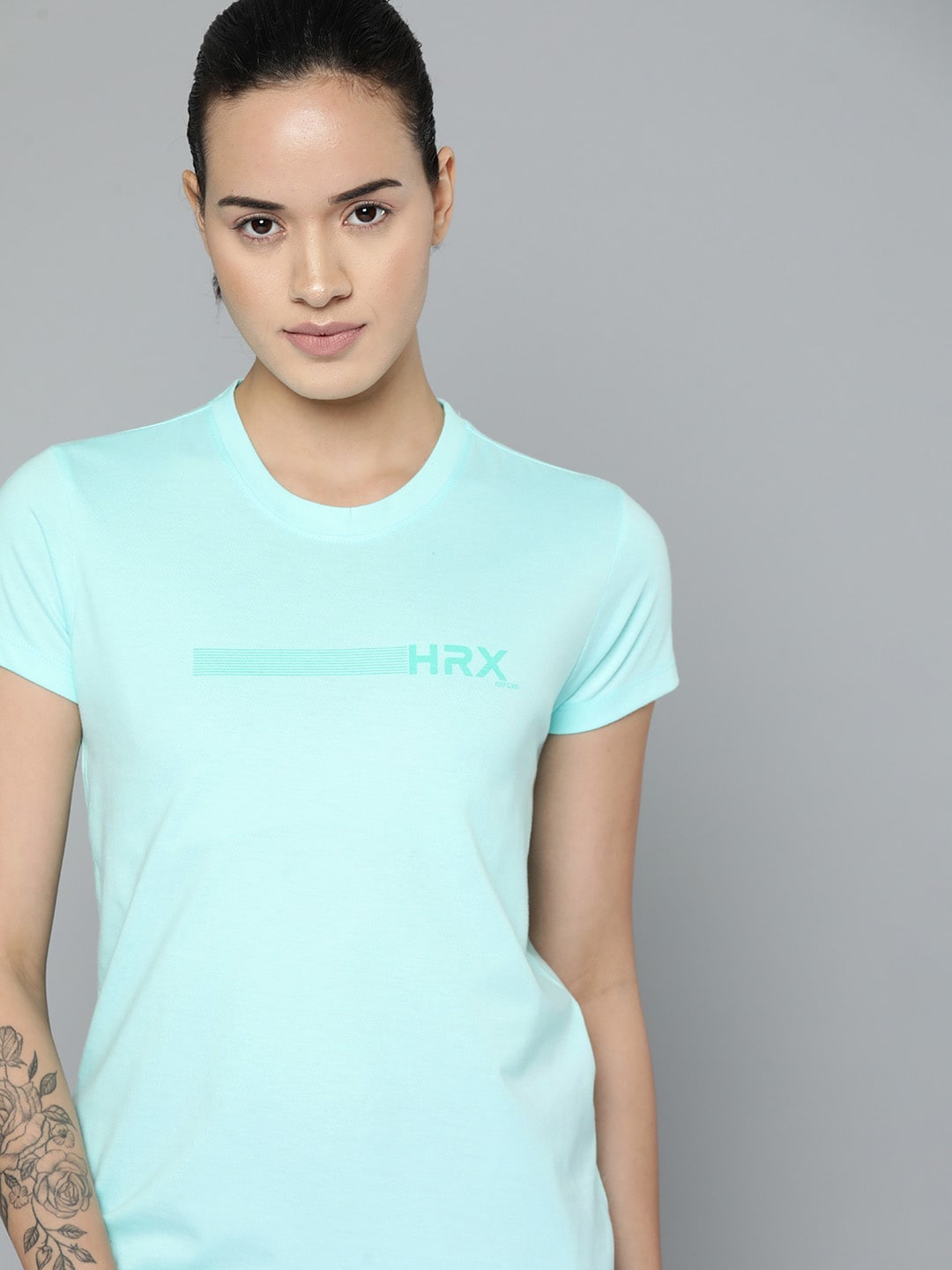 

HRX by Hrithik Roshan Women Solid T-shirt, Green