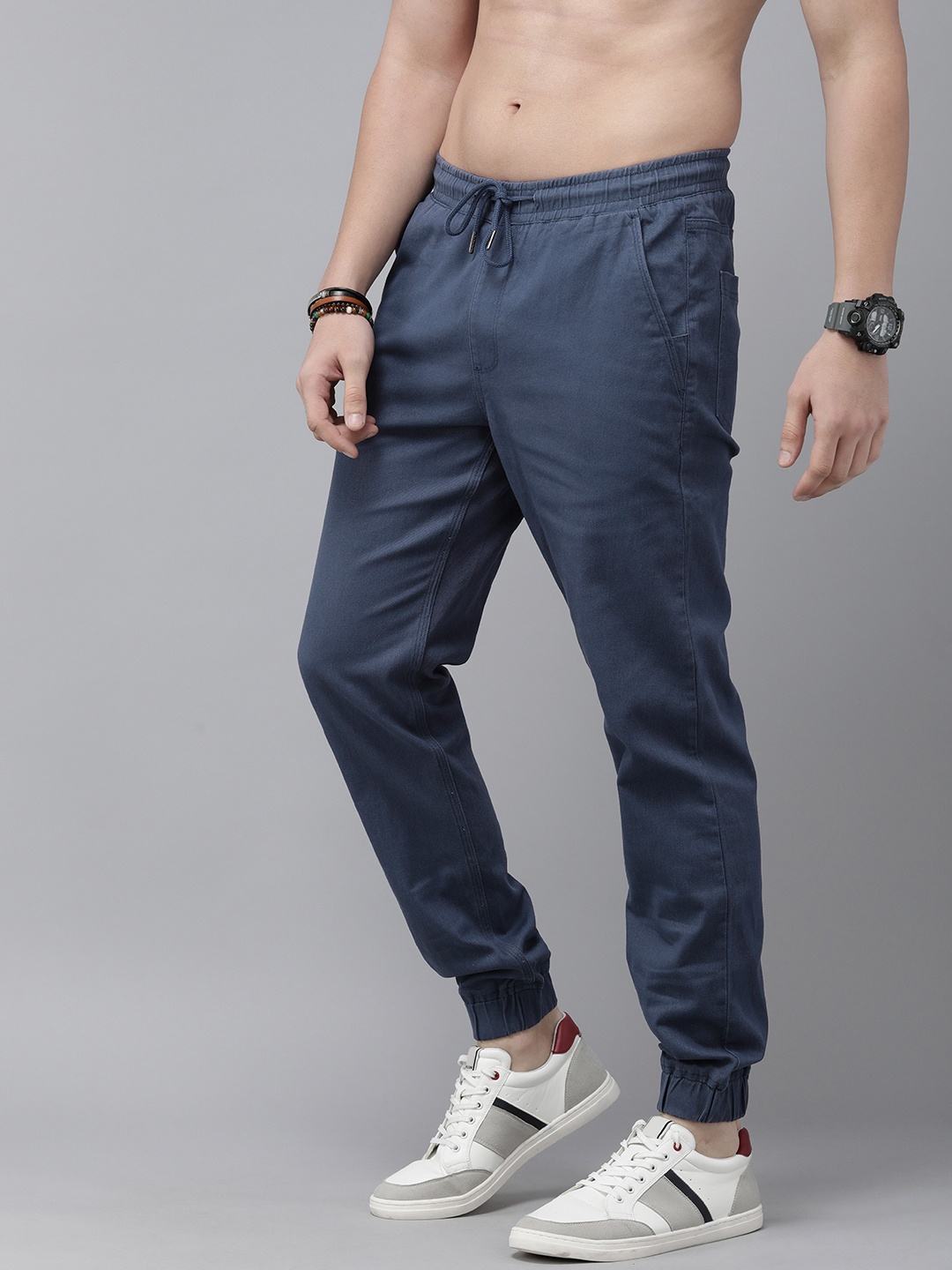 

The Roadster Life Co. Men Solid Mid-Rise Jogger Trousers, Navy blue