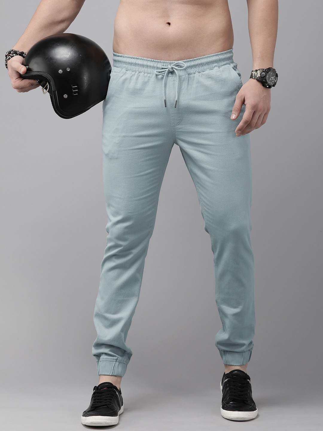 

The Roadster Lifestyle Co. Men Solid Mid Rise Joggers, Blue