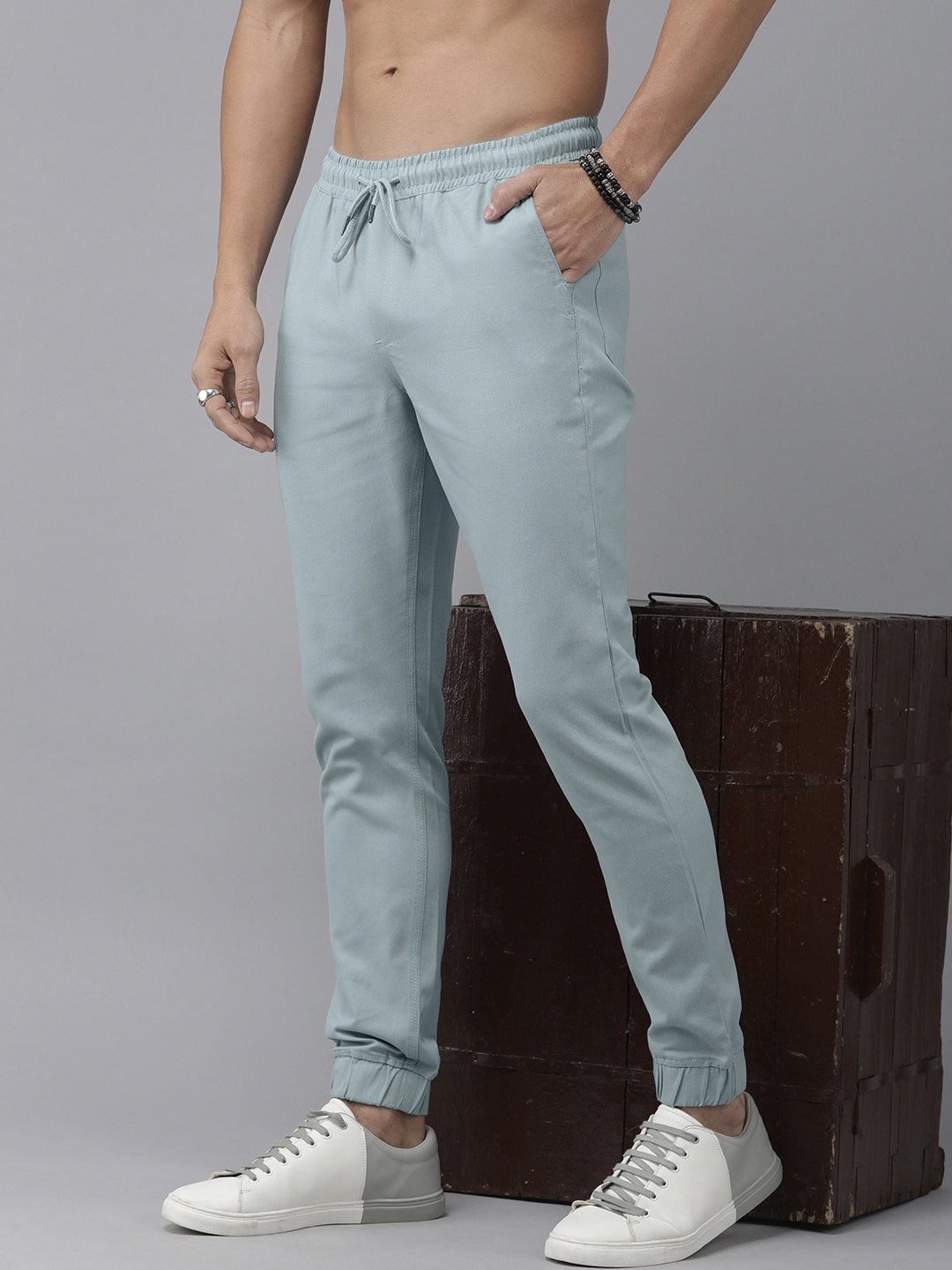 

The Roadster Lifestyle Co. Men Solid Pleated Mid-Rise Joggers, Blue