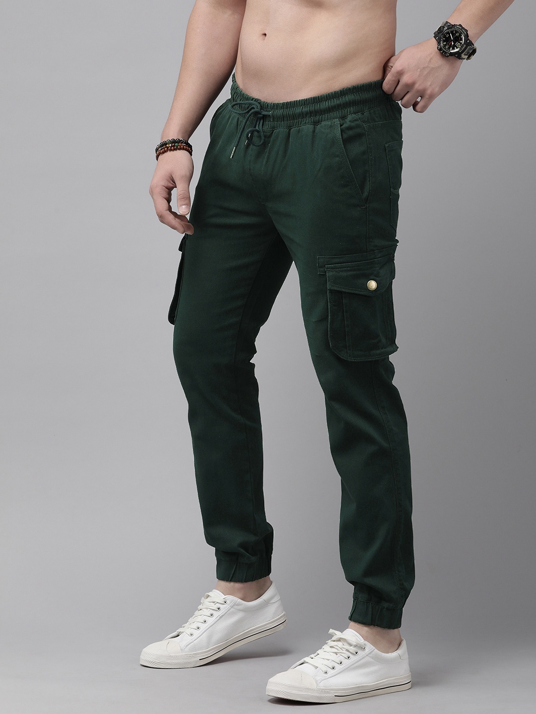 

The Roadster Lifestyle Co. Men Solid Mid Rise Cargo Joggers, Teal