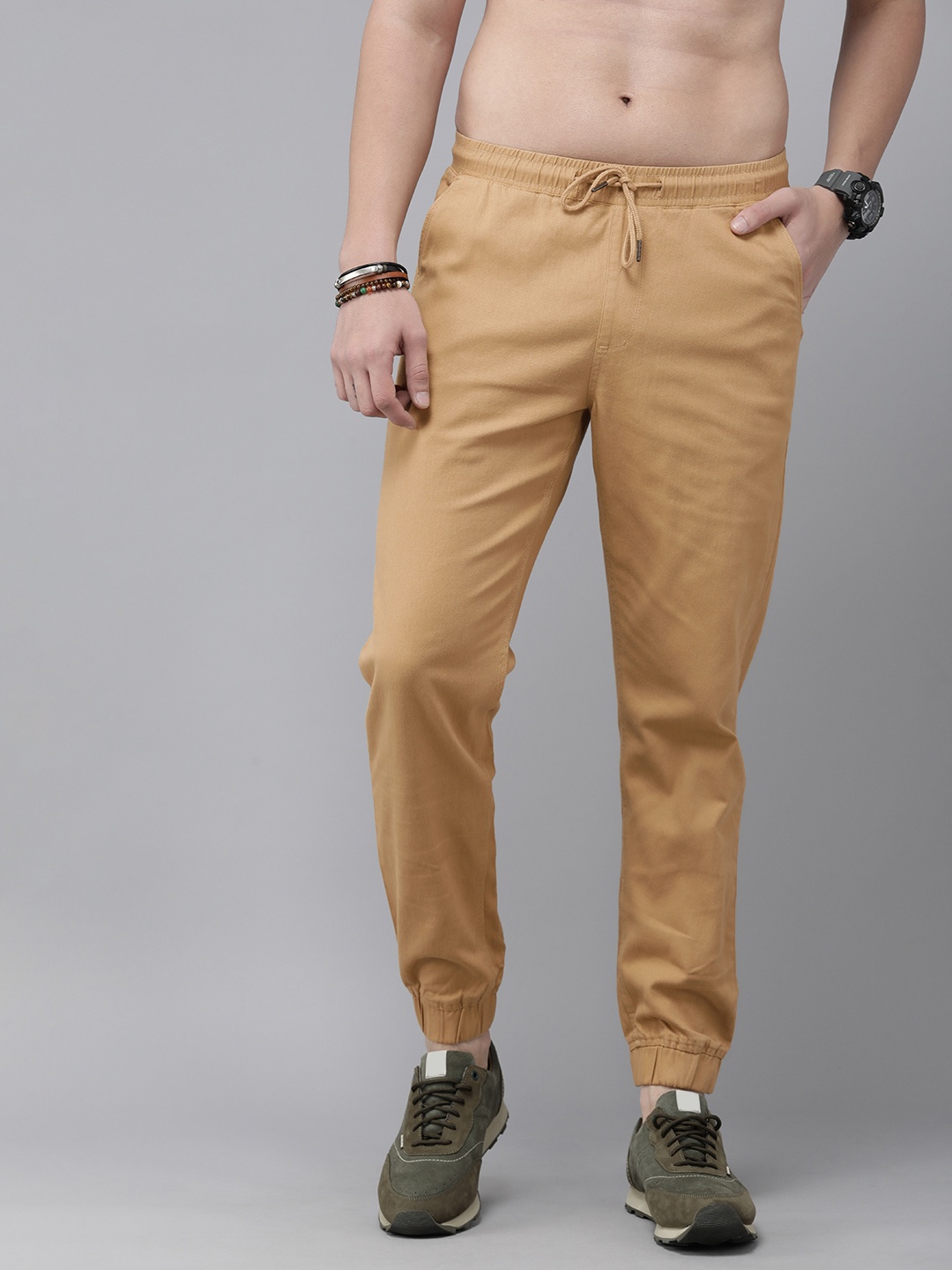 

The Roadster Life Co. Men Solid Mid-Rise Jogger Trousers, Brown