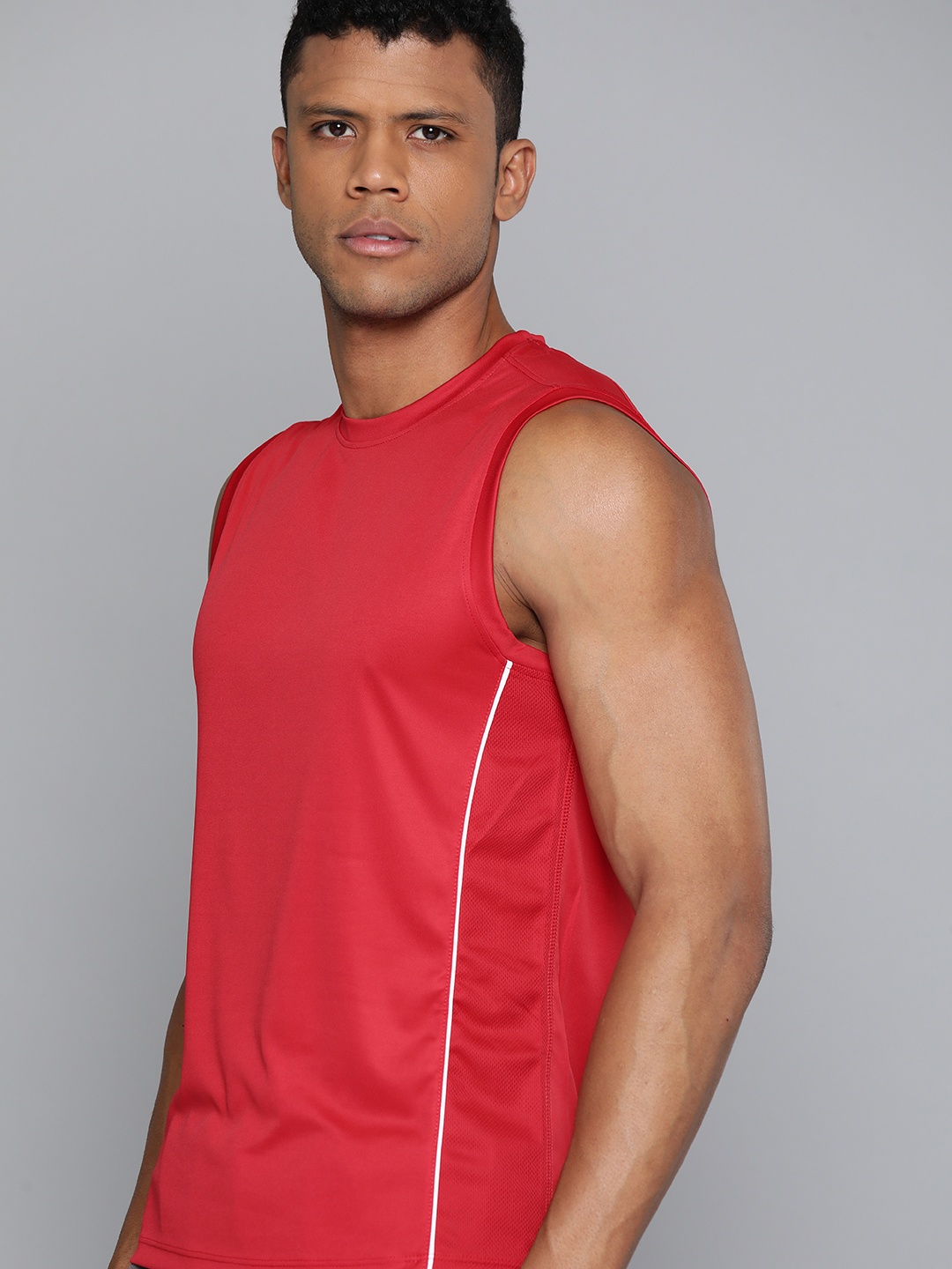 

HRX by Hrithik Roshan Men Solid Training T-shirt, Red