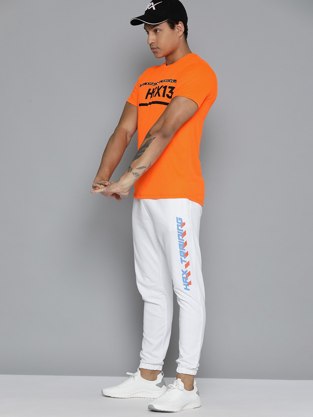 

HRX by Hrithik Roshan Men Brand Logo Printed Rapid-Dry Training T-shirt, Orange