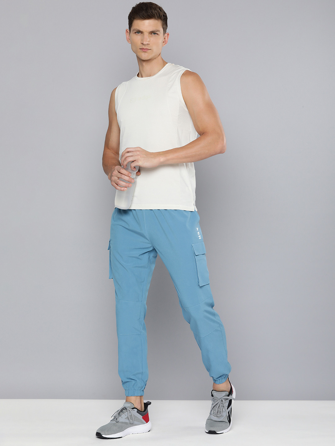 

HRX by Hrithik Roshan Men Mid-Rise Regular Fit Rapid Dry Anti-Microbial Training Joggers, Blue