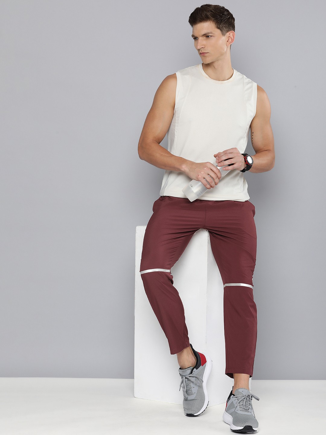 

HRX by Hrithik Roshan Men Antimicrobial Finish Training Rapid-Dry Sports Track Pants, Maroon