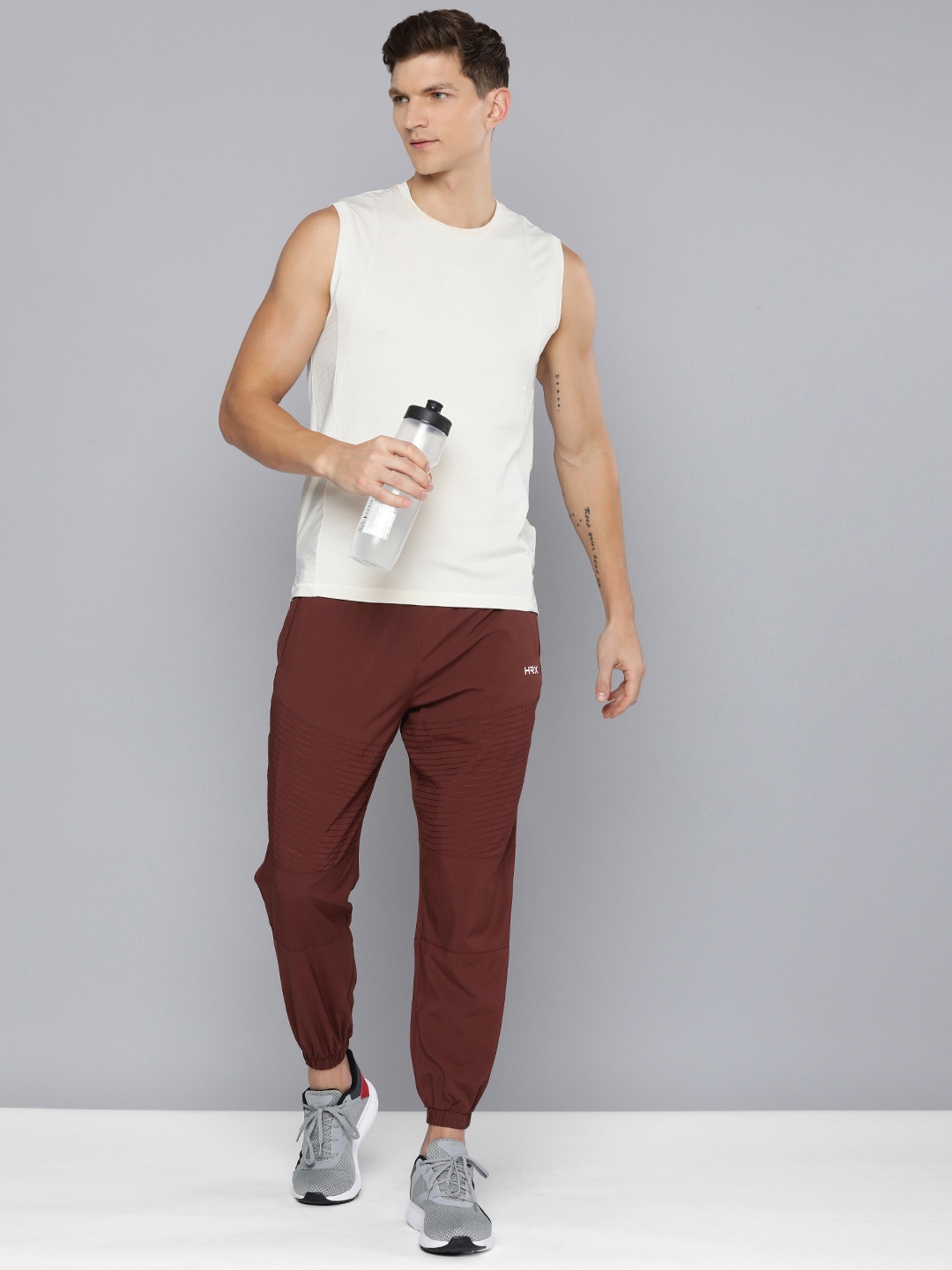 

HRX by Hrithik Roshan Men Antimicrobial Finish Rapid-Dry Training Joggers Track Pants, Maroon