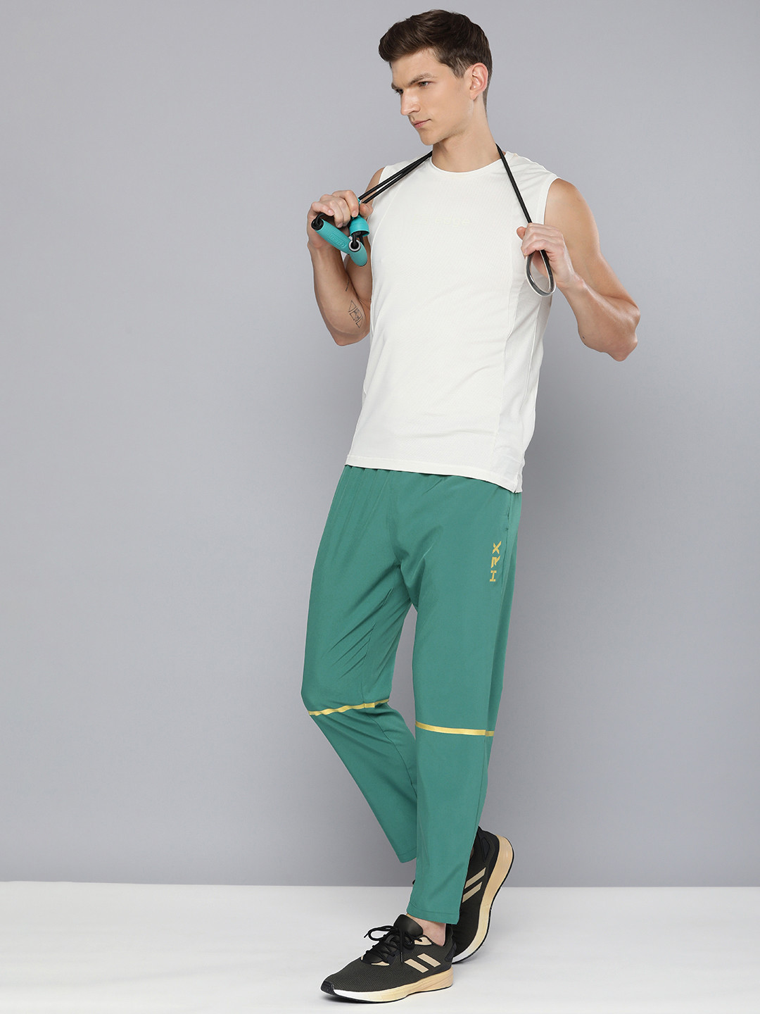 

HRX by Hrithik Roshan Men MR Regular Fit Rapid Dry Anti-Microbial Training Track Pants, Teal