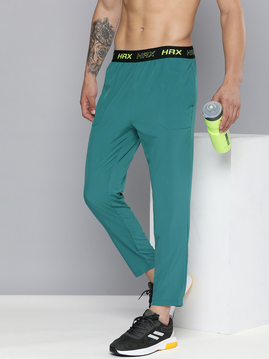 

HRX by Hrithik Roshan Men MR Tapered Fit Rapid Dry Anti-Microbial Training Track Pants, Teal