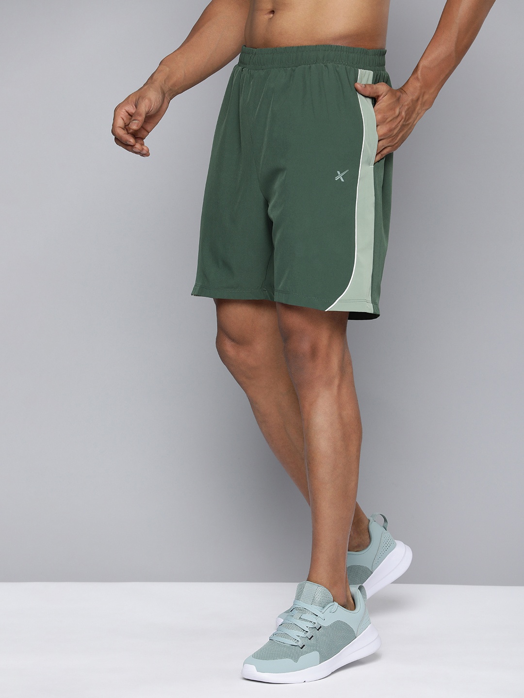 

HRX by Hrithik Roshan Men Solid Rapid-Dry Sports Shorts With Side Stripes, Green