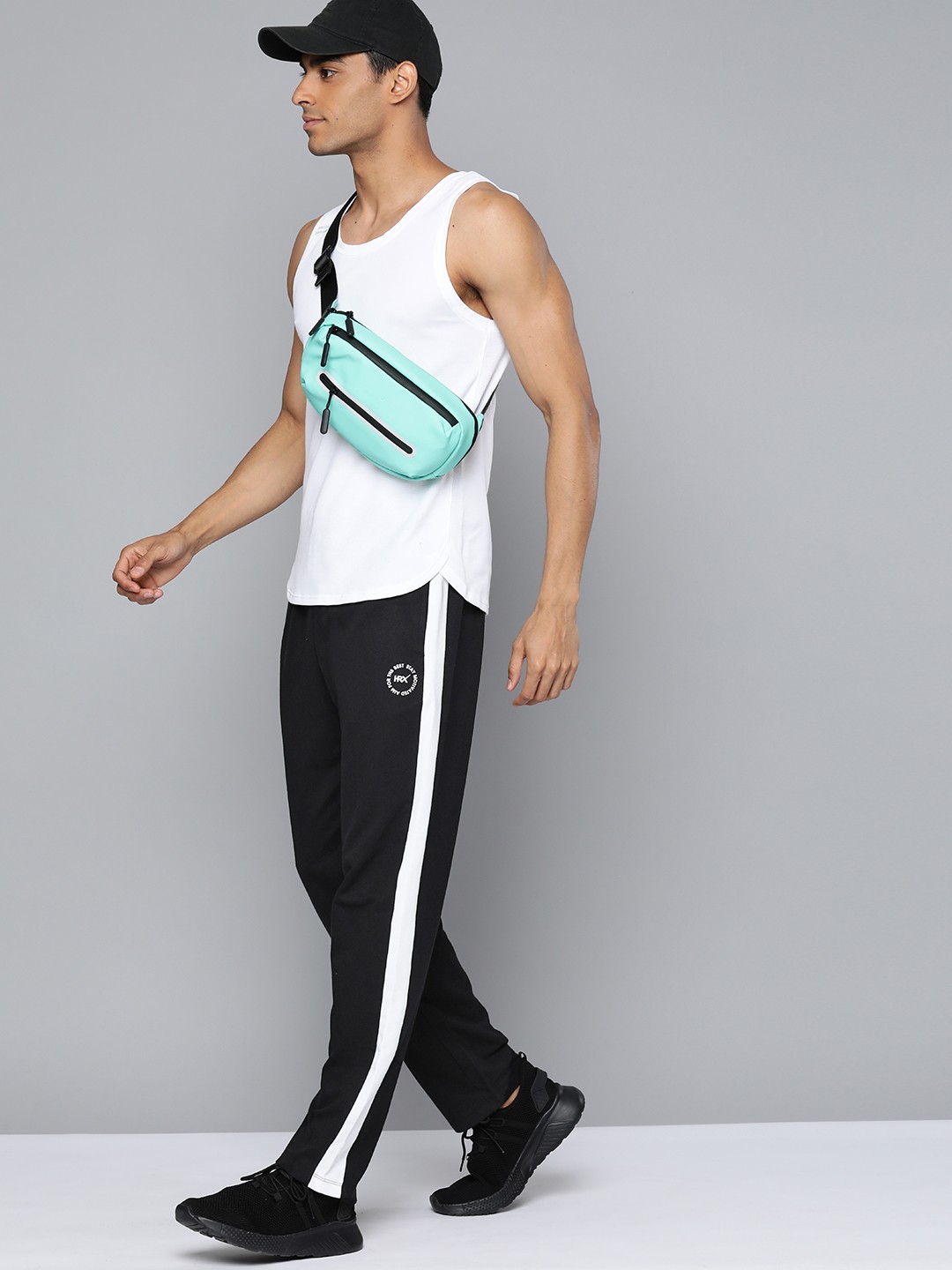 

HRX by Hrithik Roshan Men Stripes Detail Straight Fit Lifestyle Track Pants, Black