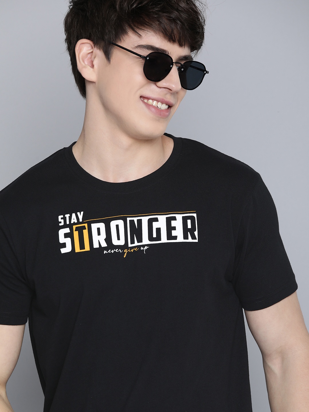 

HERE&NOW Men Typography Printed Round Neck T-shirt, Black