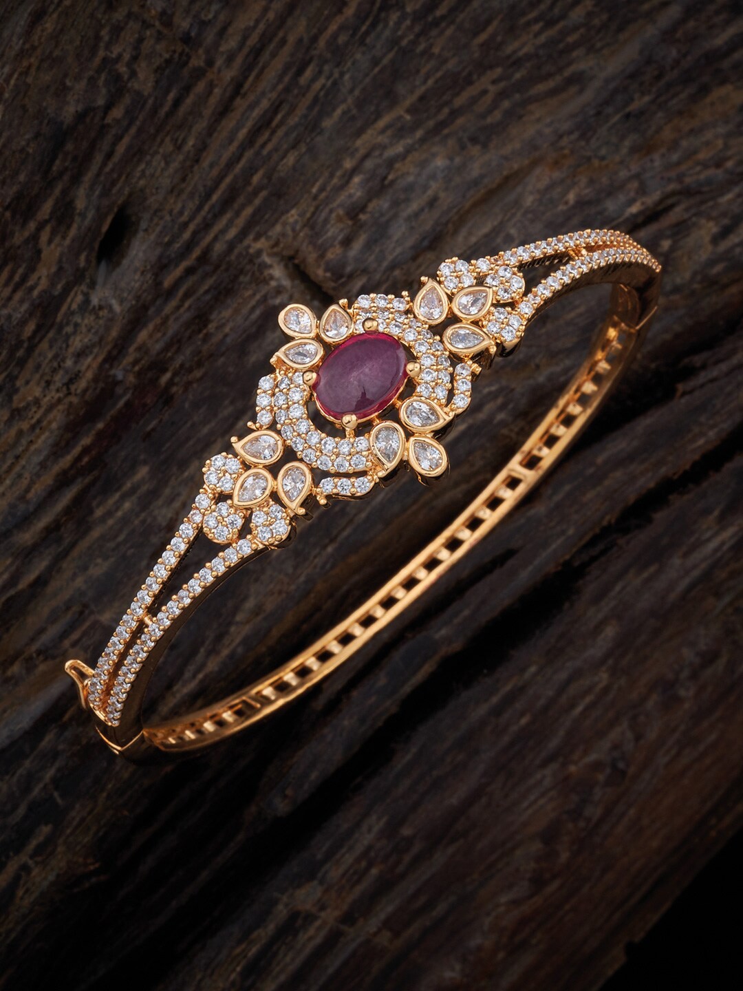 

Kushal's Fashion Jewellery Women Cubic Zirconia Gold-Plated Kada Bracelet