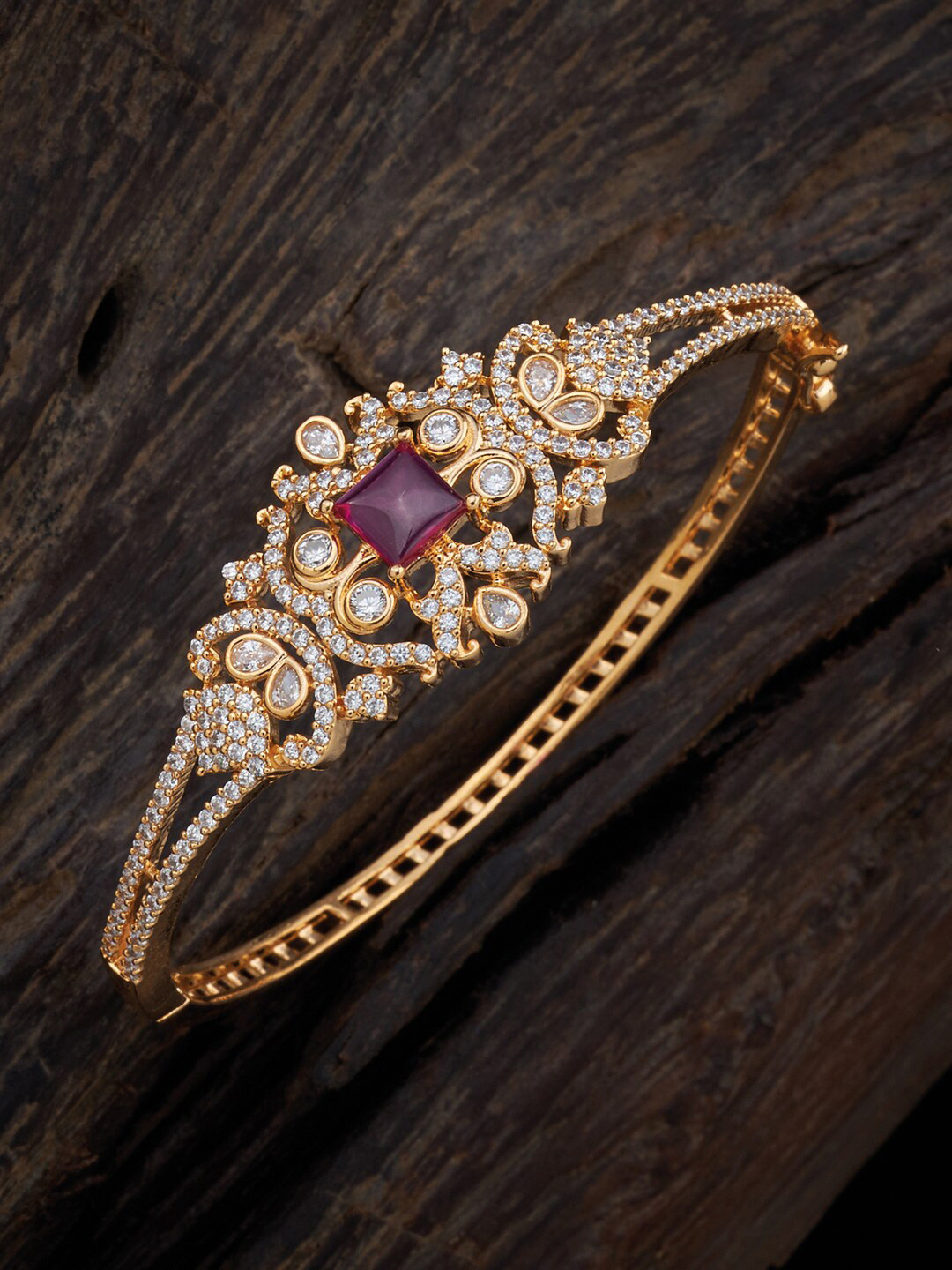 

Kushal's Fashion Jewellery Women Cubic Zirconia Gold-Plated Kada Bracelet