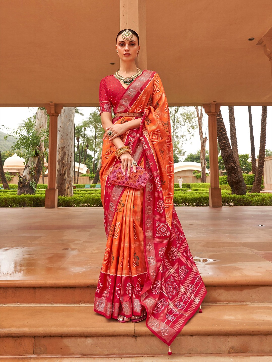 

Mitera Ethnic Motifs Printed Zari Patola Saree, Orange