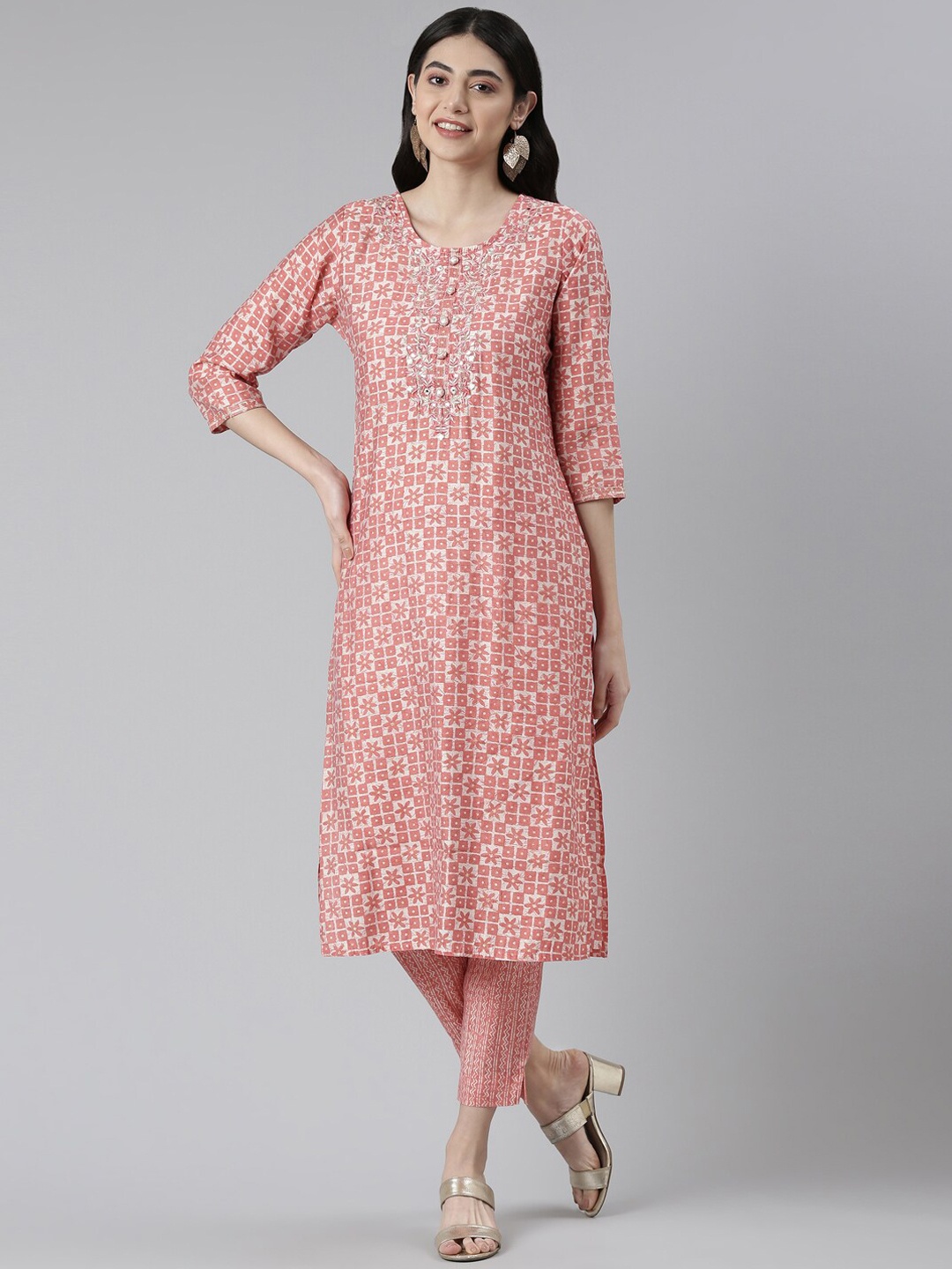 

Neerus Women Ethnic Motifs Printed Mirror Work Kurta with Trousers, Peach
