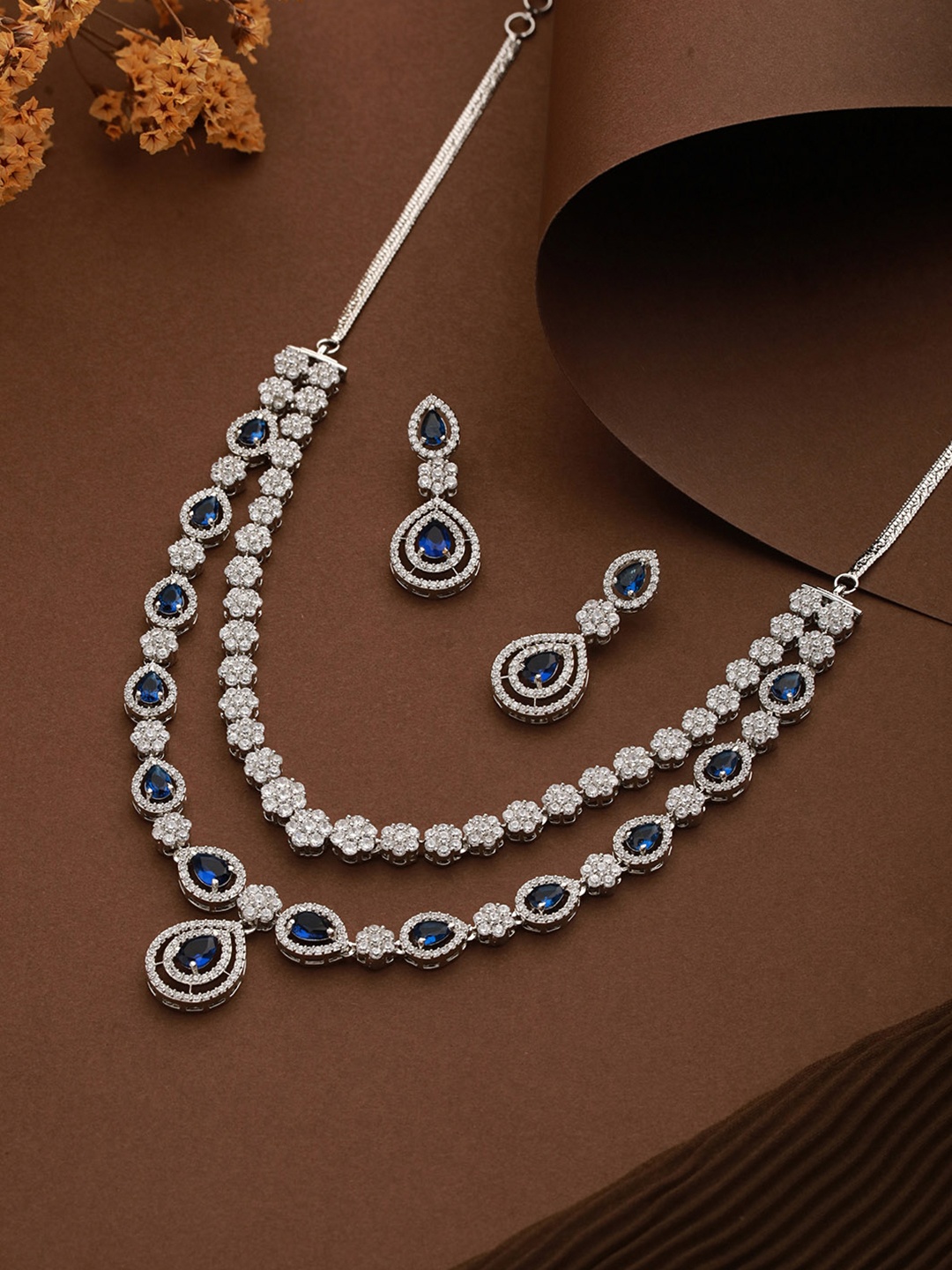 

Saraf RS Jewellery Women Silver-Plated AD-Studded Necklace and Earrings, Navy blue