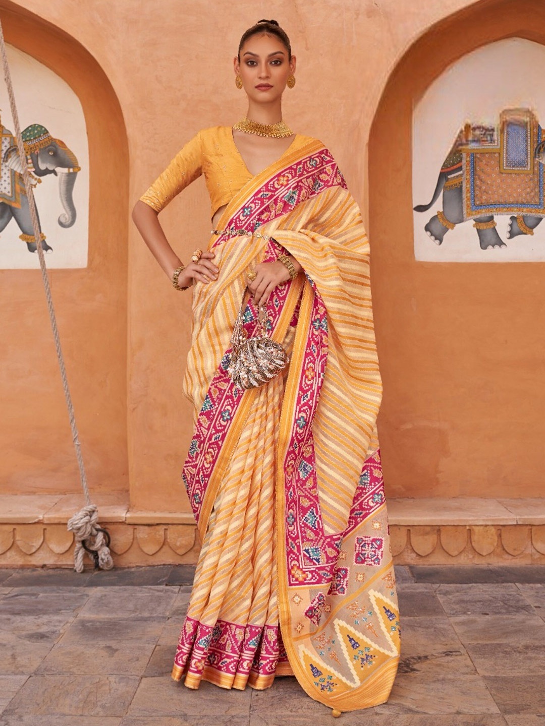 

Mitera Striped Woven Design Mirror Work Tissue Patola Saree, Yellow