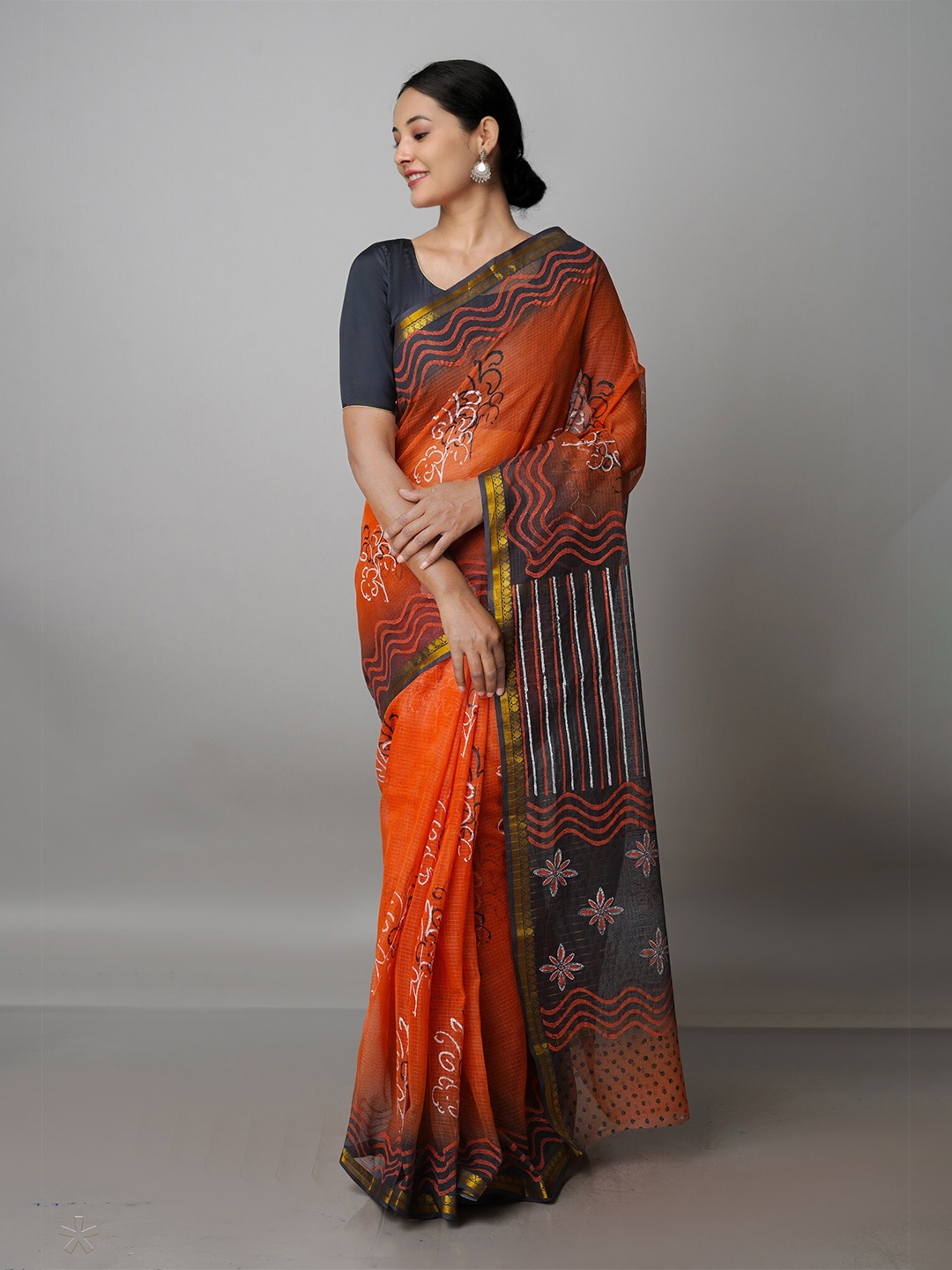 

Unnati Silks Ethnic Motifs Printed Zari Border Pure Cotton Kota Saree, Orange