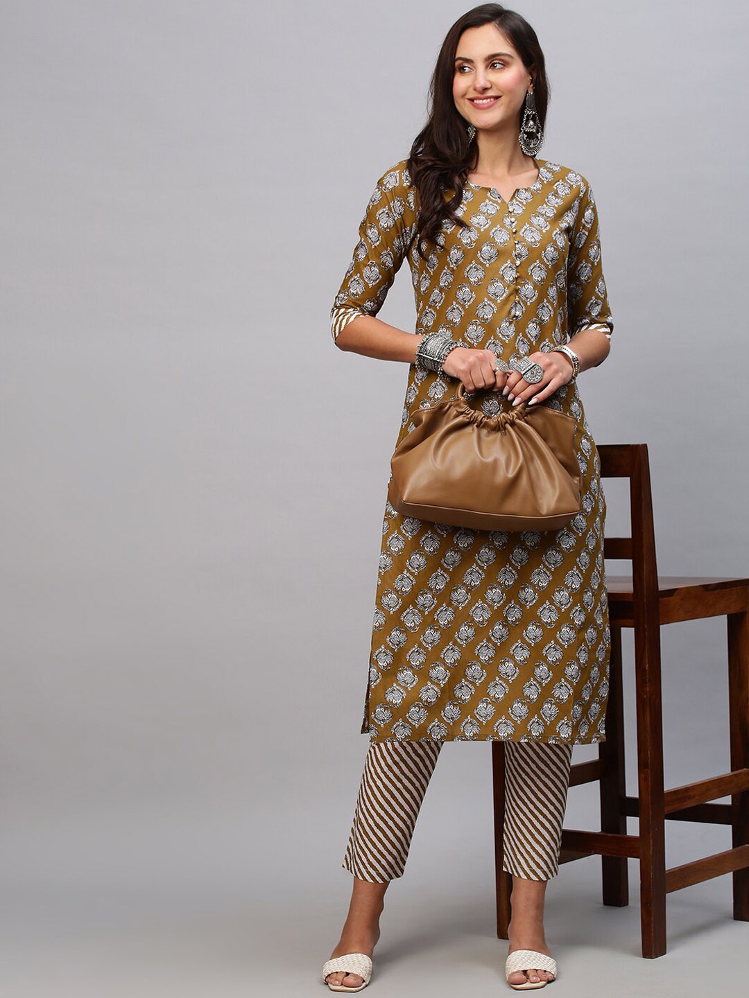 

KALINI Women Ethnic Motifs Printed Straight Kurta with Trousers, Mustard