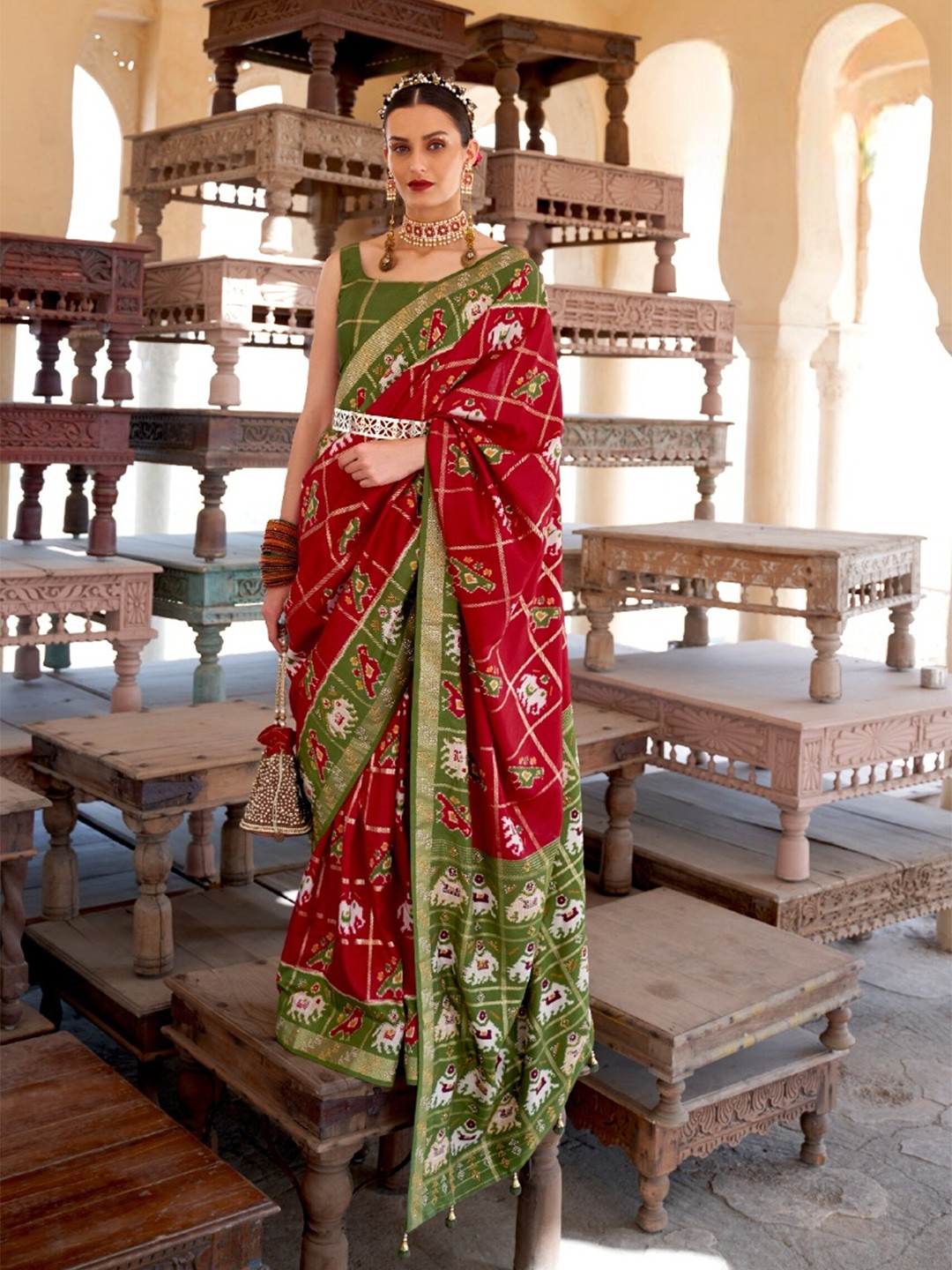 

Mitera Ethnic Motifs Printed Zari Bordered Pure Silk Patola Saree, Red