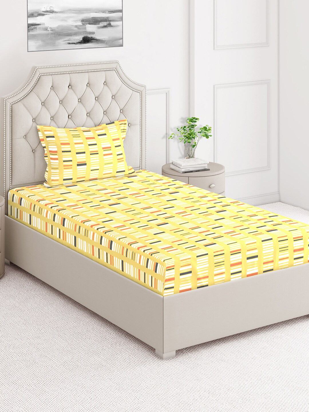

Layers Yellow & White Geometric 124 TC Flat Single Bedsheet with 1 Pillow Cover