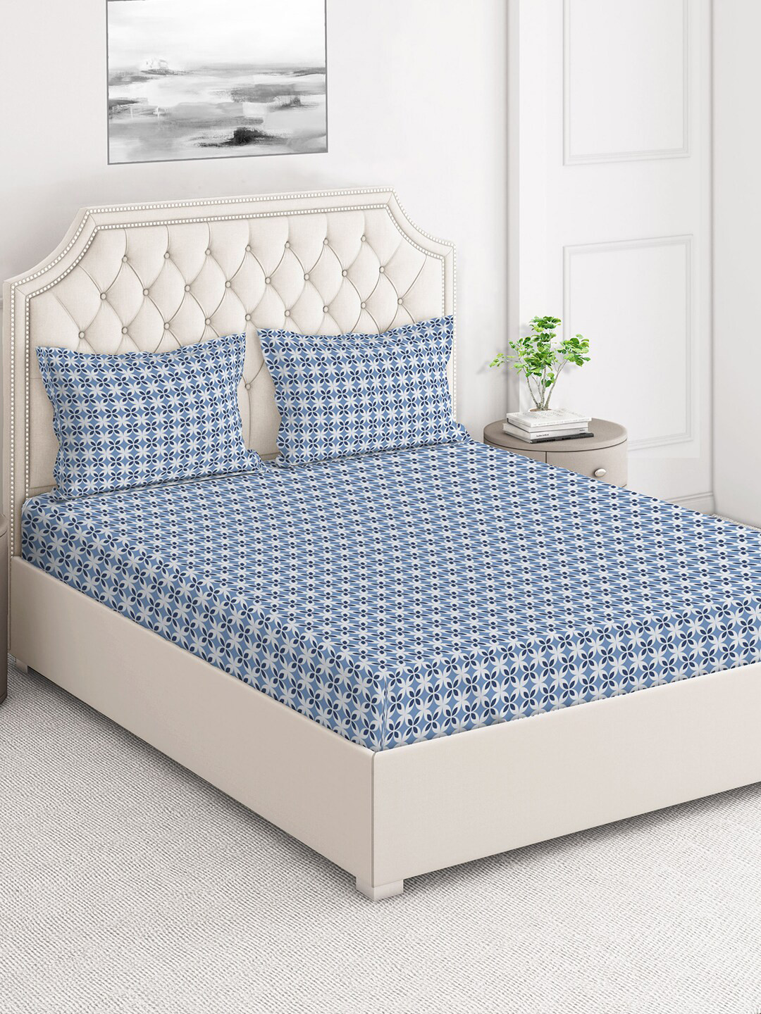 

Layers Firenze Blue & White Geometric 140 TC Flat Cotton King Bedsheet & 2 Pillow Covers