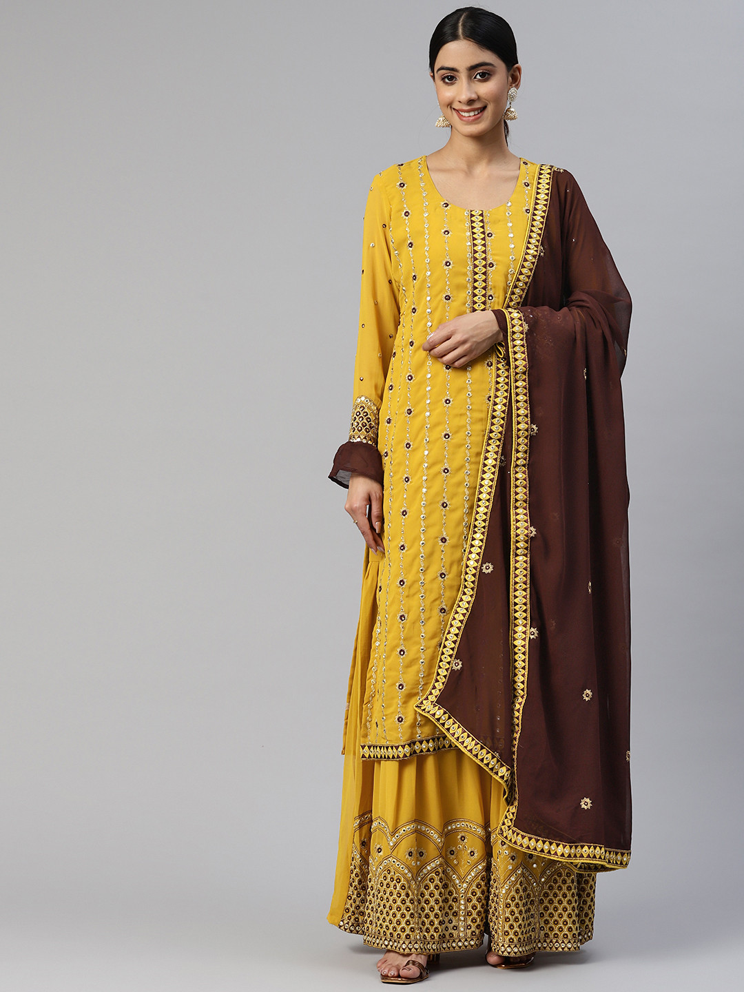 

Readiprint Fashions Embroidered Mirror Work Semi-Stitched Dress Material, Mustard