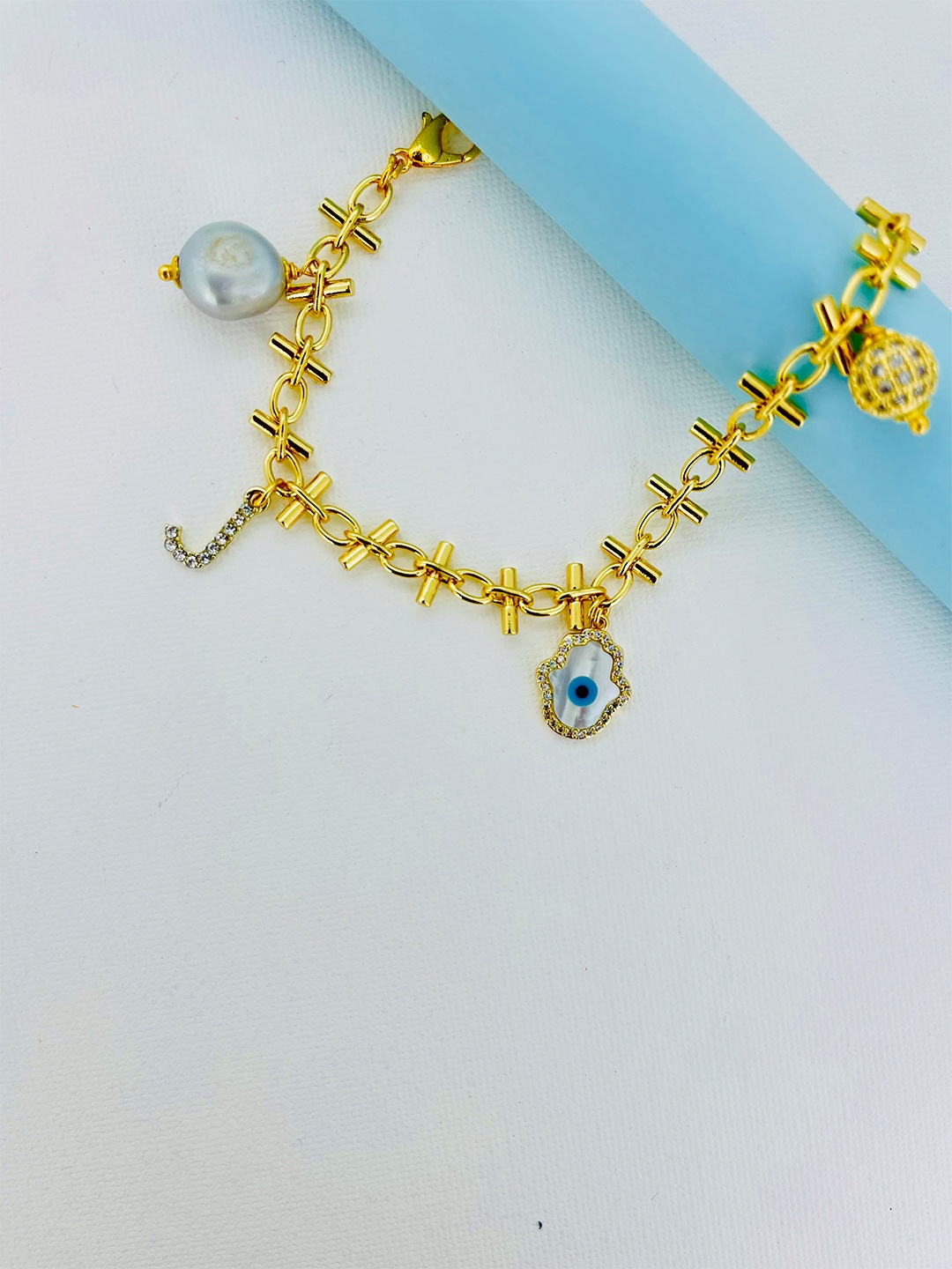 

CURIO COTTAGE Women Gold-Plated Stone Studded Charm Bracelet