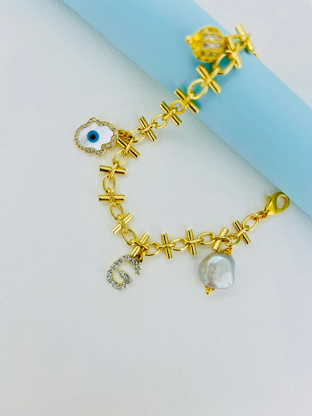 

CURIO COTTAGE Women Evil Eye Gold-Plated Charm Bracelet, White