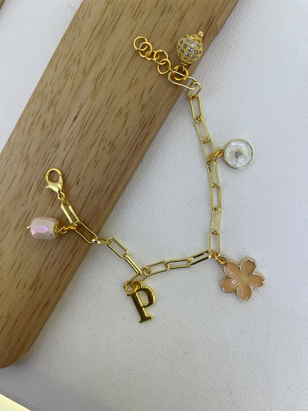 

CURIO COTTAGE Gold-Plated Charm Bracelet
