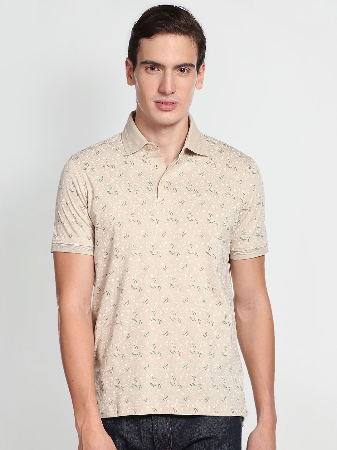 

Arrow Men Floral Printed Polo Collar Pure Cotton T-shirt, Beige