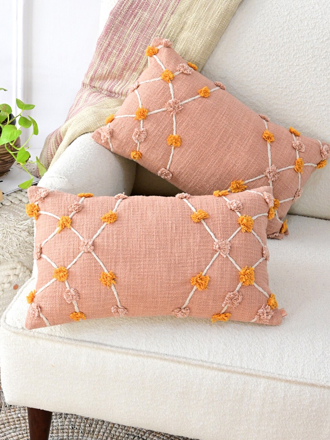 

Art Avenue Peach-Coloured & Mustard Self Design Cotton Rectangle Cushion Cover