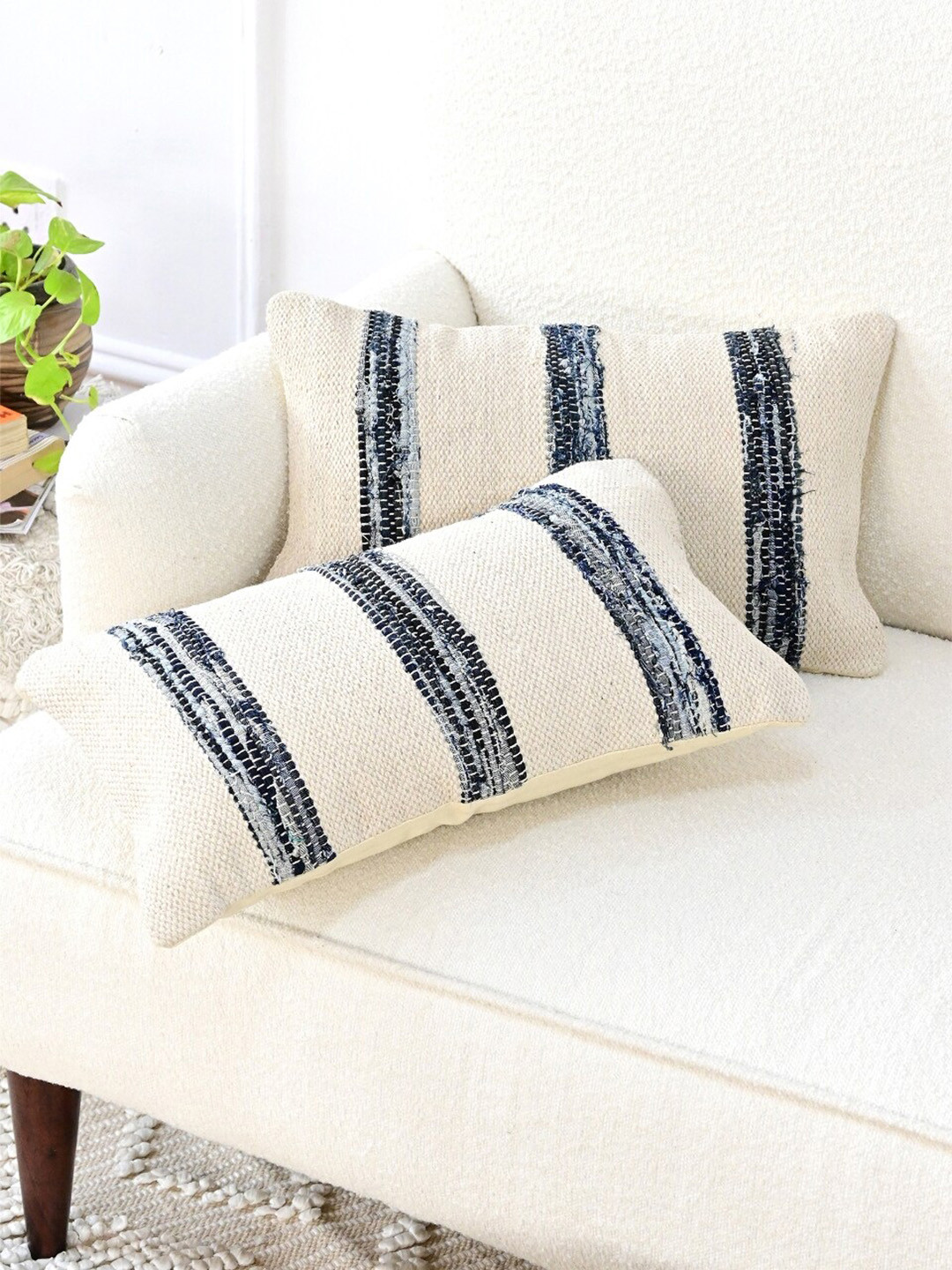 

Art Avenue White & Blue Self Design Cotton Rectangle Cushion Cover