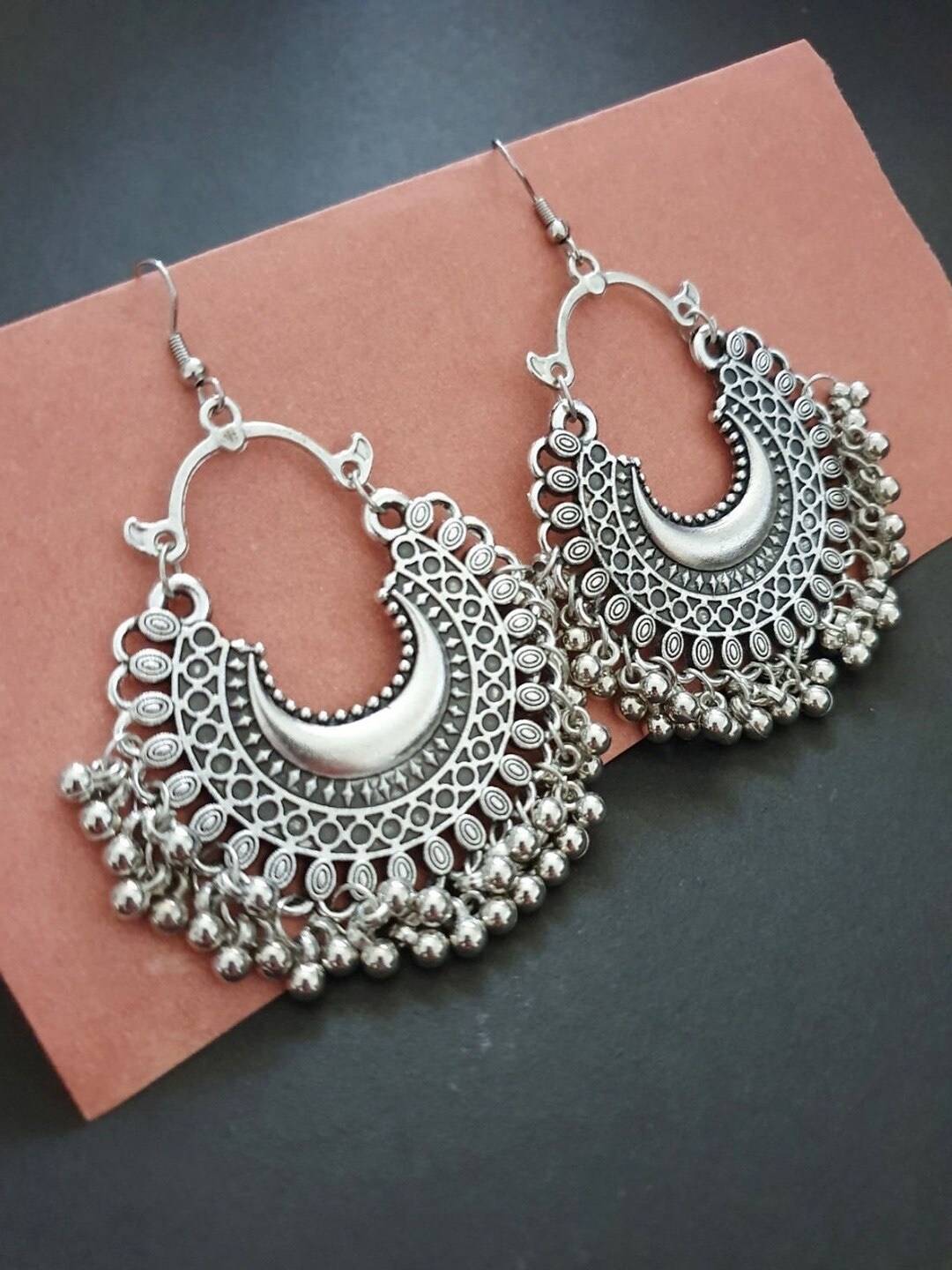 

VAGHBHATT Silver Plated Contemporary Stone Studded Chandbalis Earrings